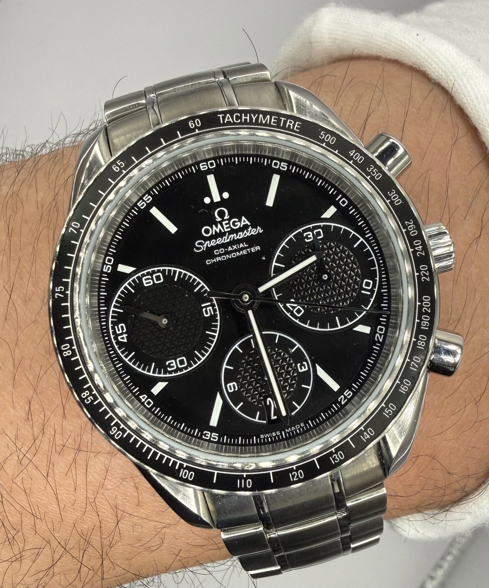 May be an image of wrist watch and text