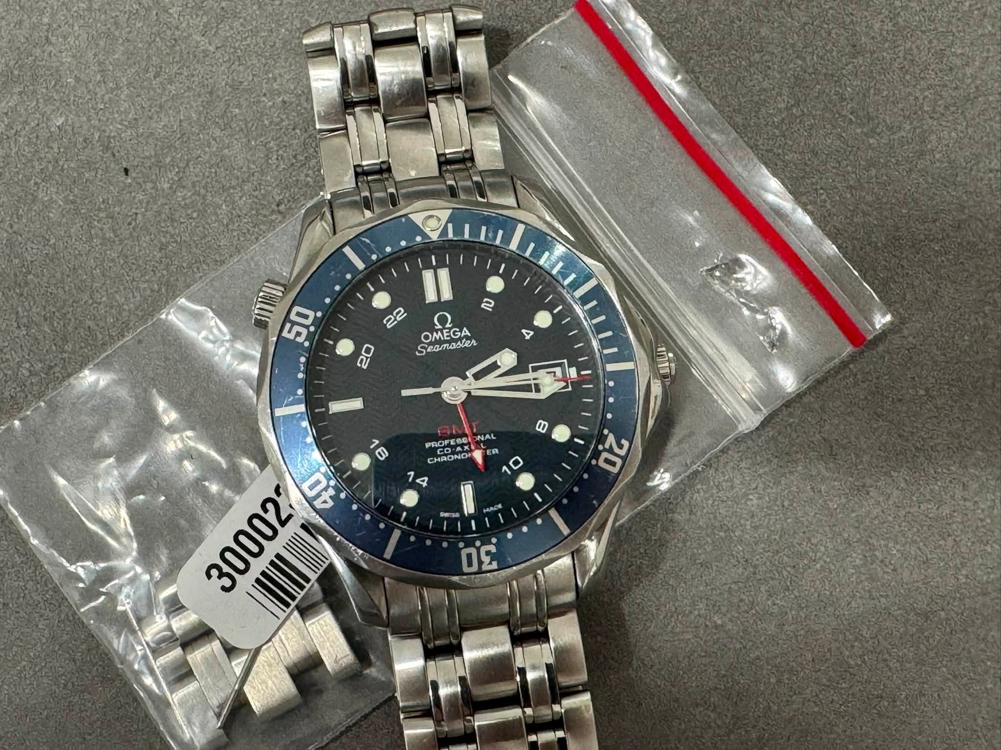 May be an image of wrist watch and text that says 'מאווה 50 2 22 OMEGA Scamasler eamasar OTe 20 4 ហាំរិ 0 8 PROFE DAK ន AONAL PRO CHRONO ٥ '