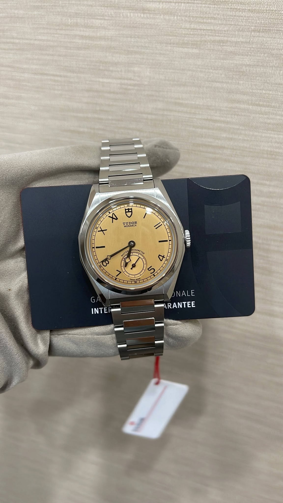 May be an image of wrist watch and text