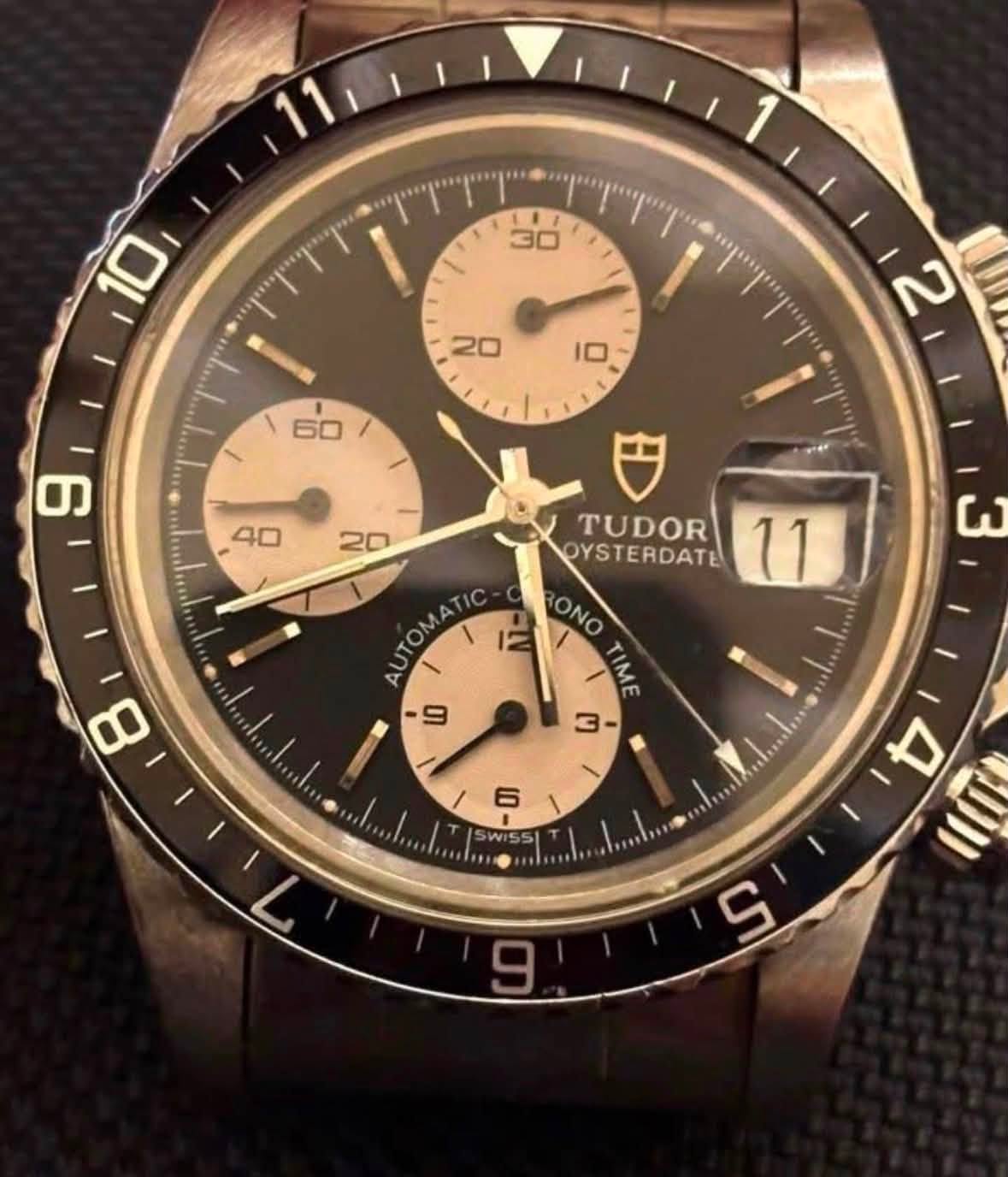 May be an image of wrist watch and text that says 'I 30 10 I سا ١ ወ TUDOR OYSTERDATE 11 ONO TIME 3 AU 9 8 6 1 WISSI 4 ומש ဟ'