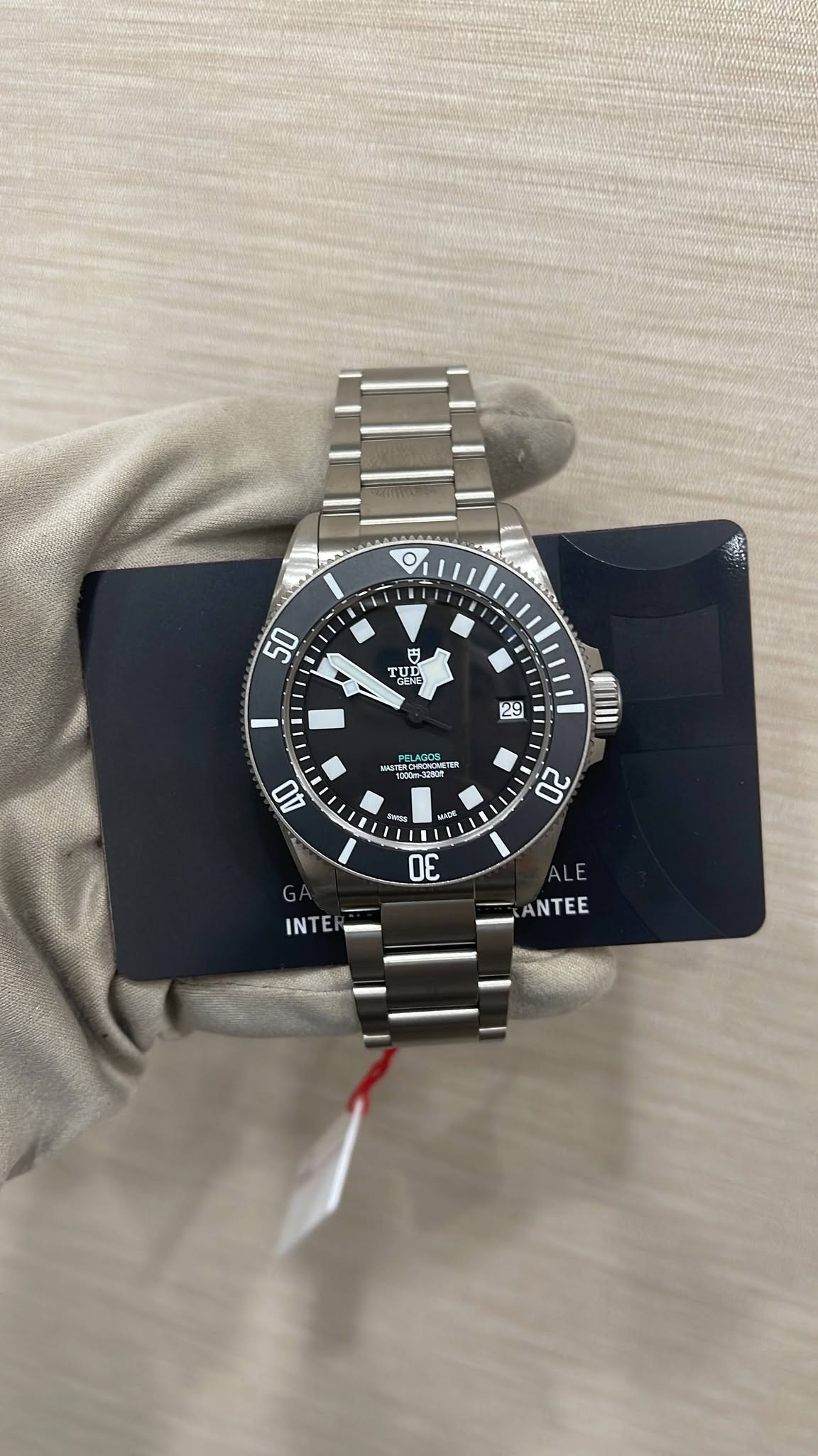 May be an image of wrist watch and text
