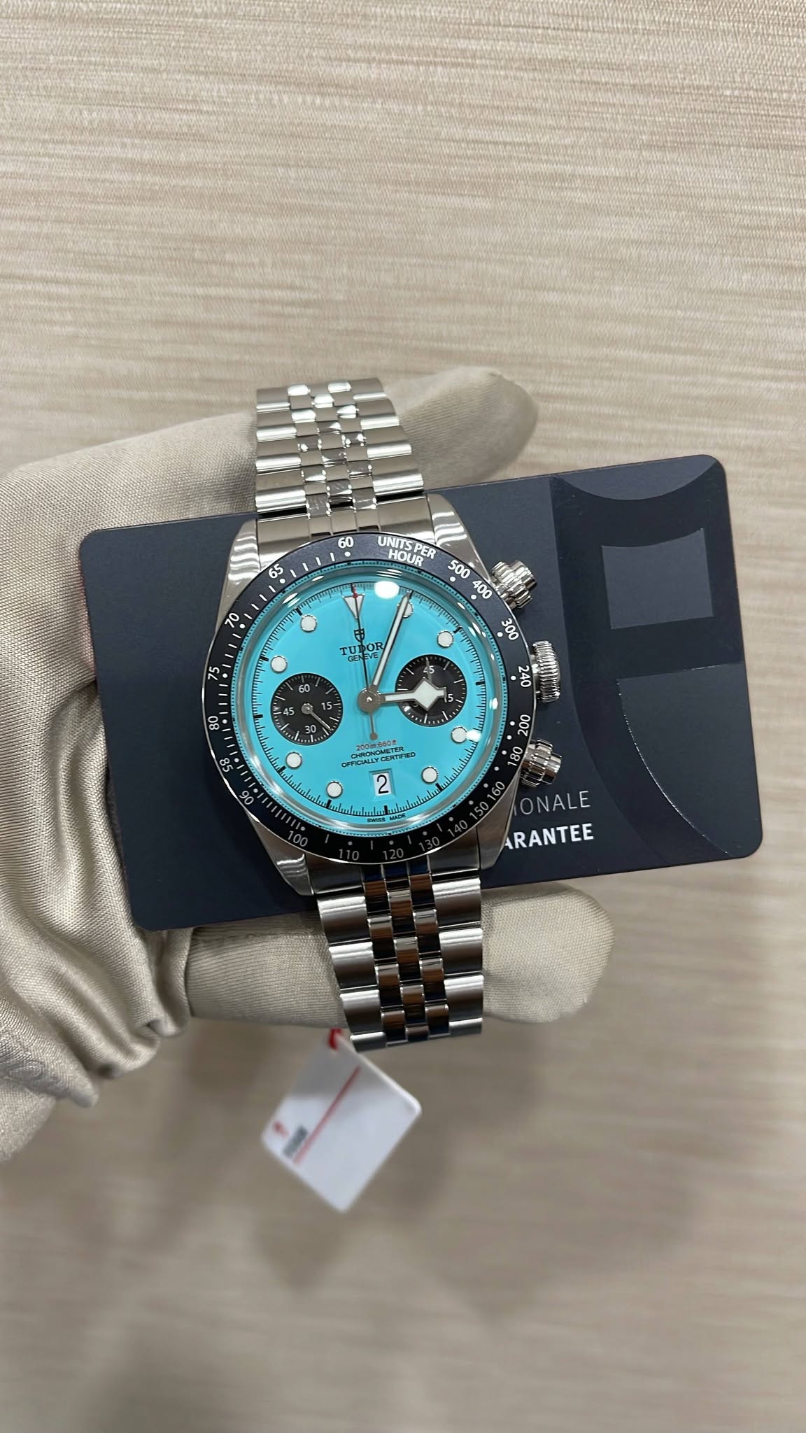 May be an image of wrist watch and text