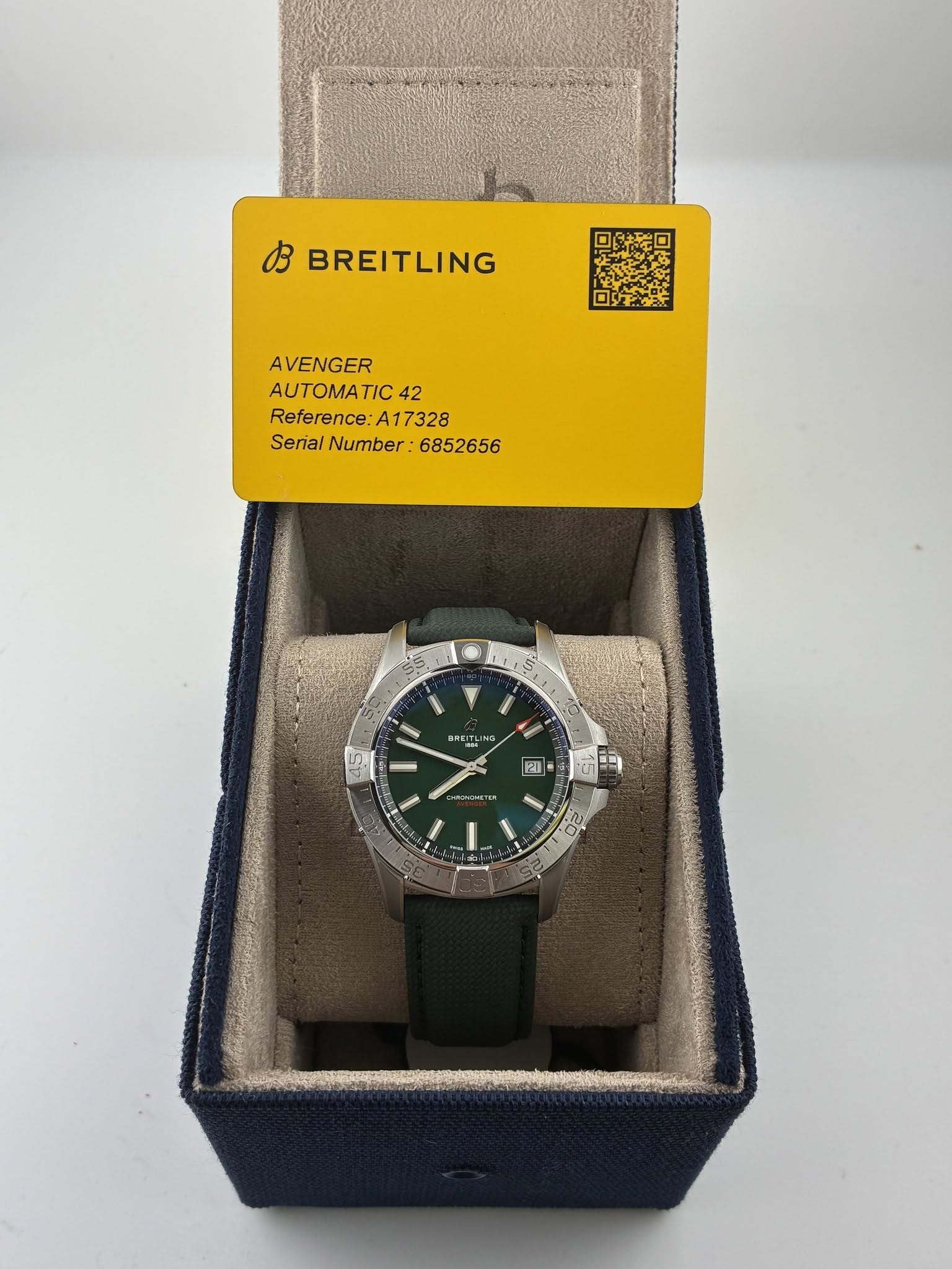 May be an image of wrist watch and text that says 'B BREITLING AVENGER 42 Reference: A17328 Serial SerialNumber:6852656 Number. WITh H P KИKc 버 DC ក១ី០ 生 N'