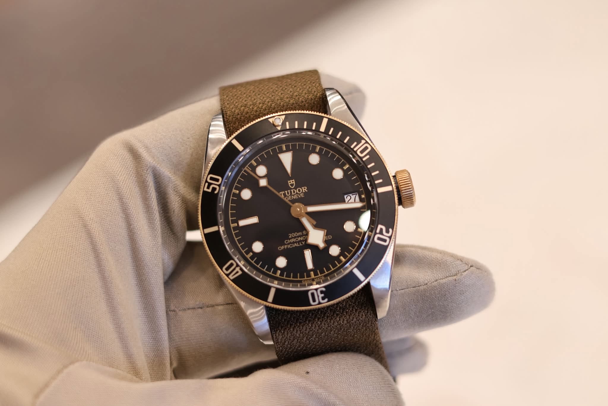 May be an image of wrist watch and text