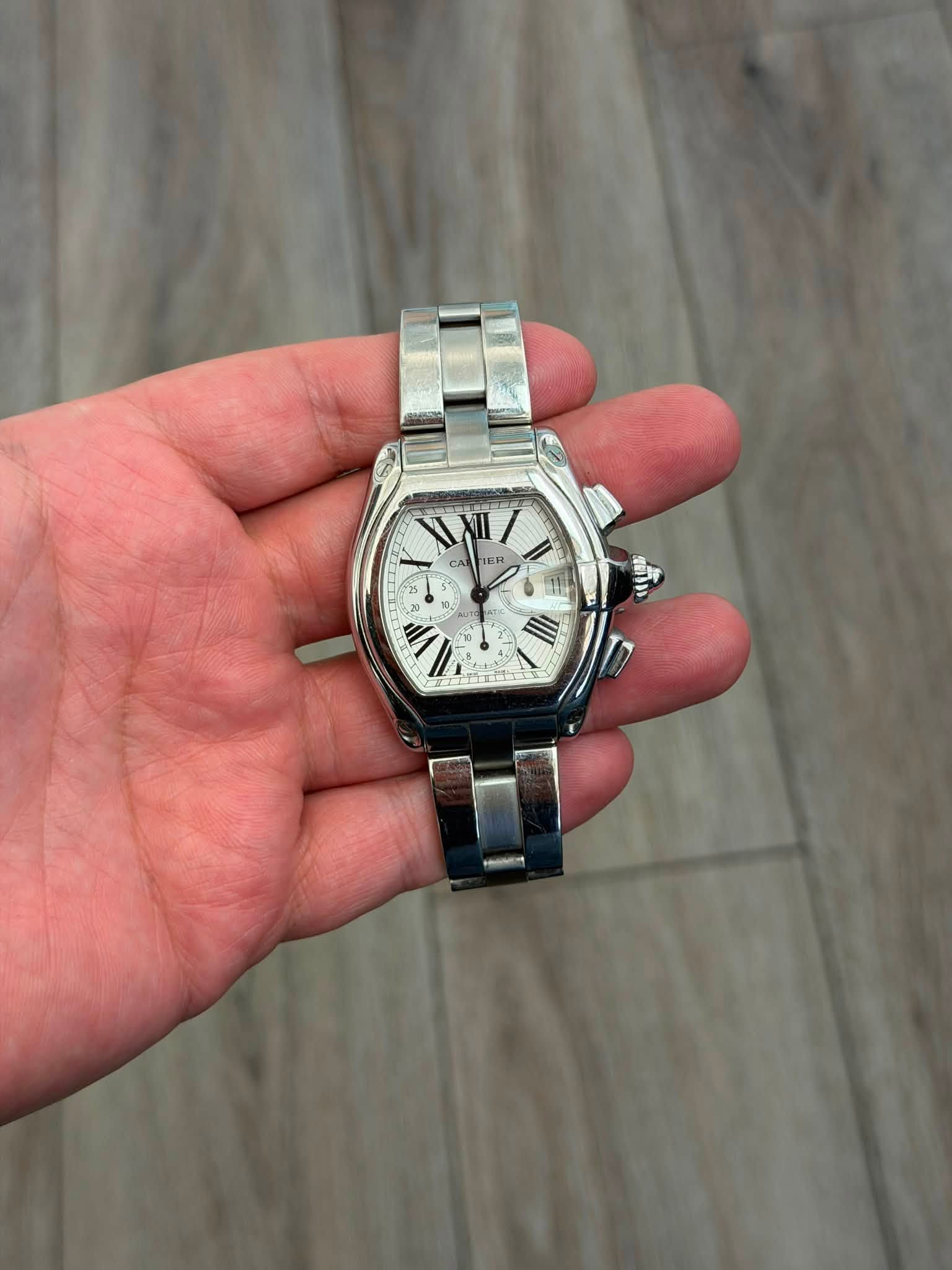 May be an image of digital watch and text