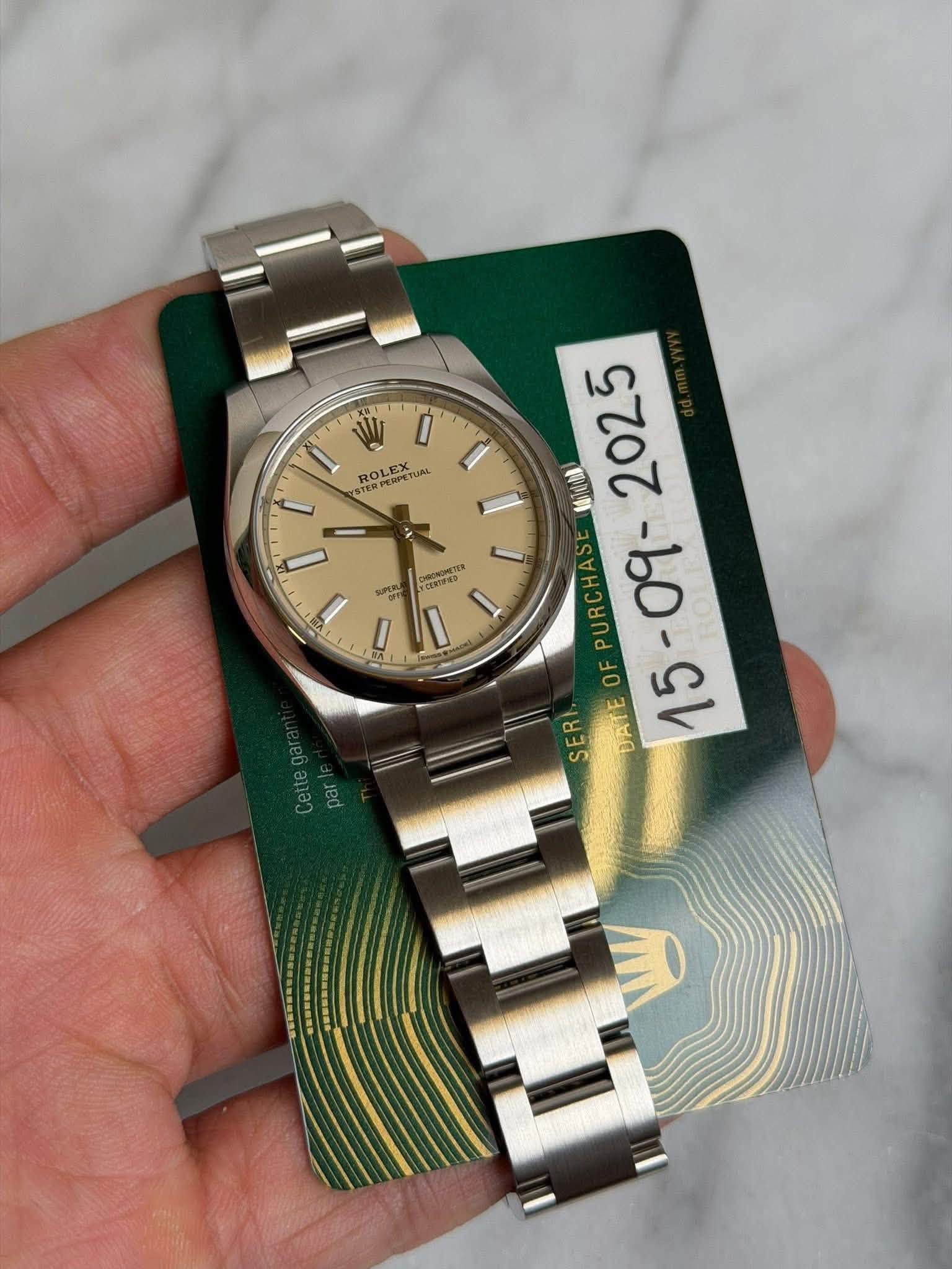 May be an image of wrist watch and text
