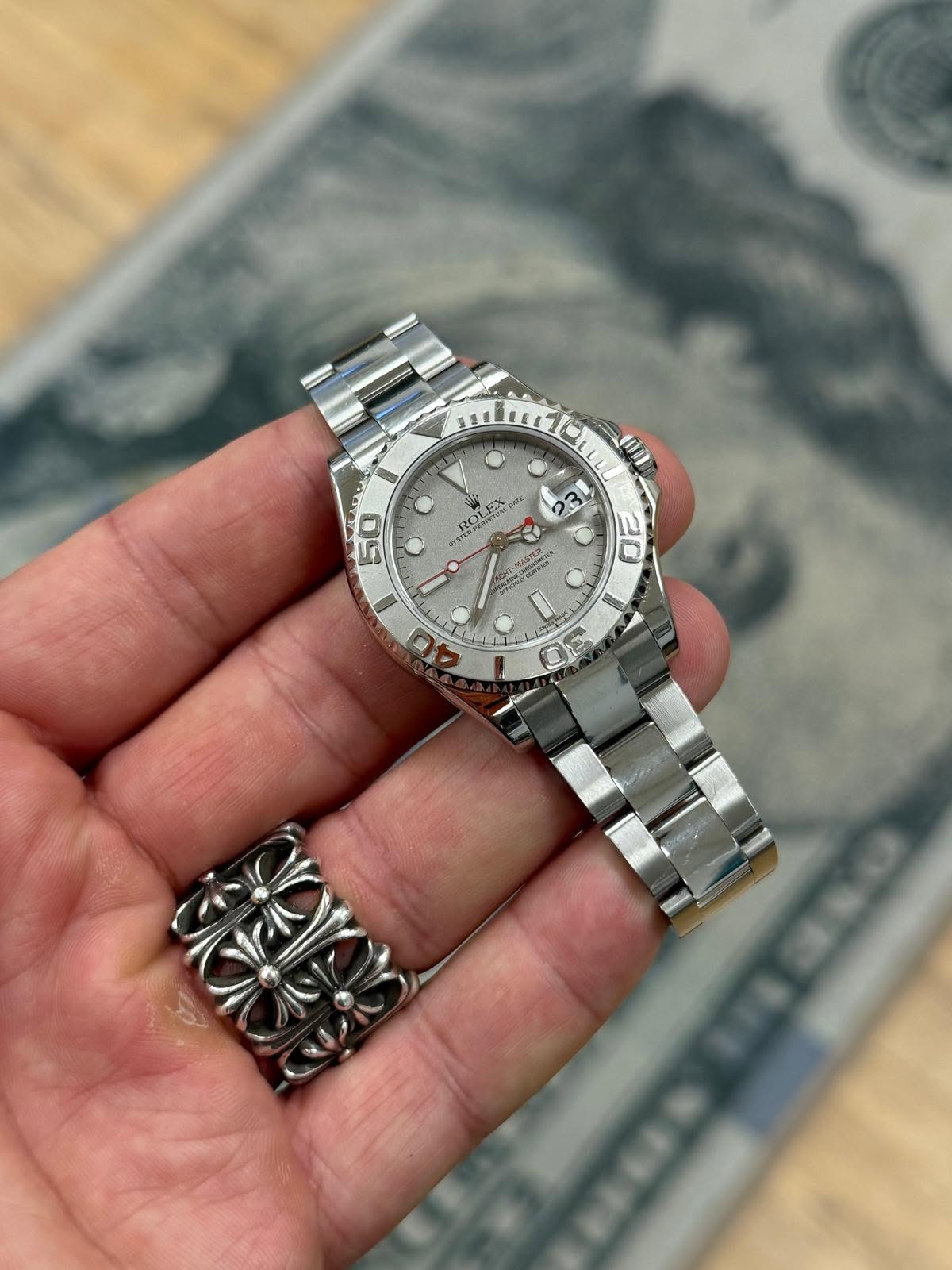 May be an image of wrist watch and text