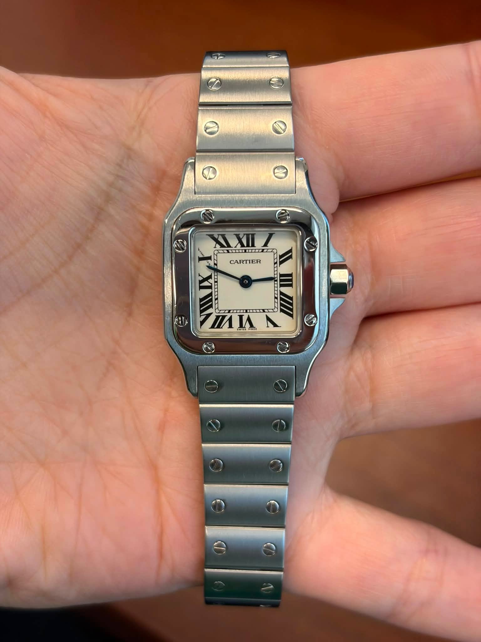 May be an image of wrist watch and text that says 'AS CARTIER 袥袠 A S'