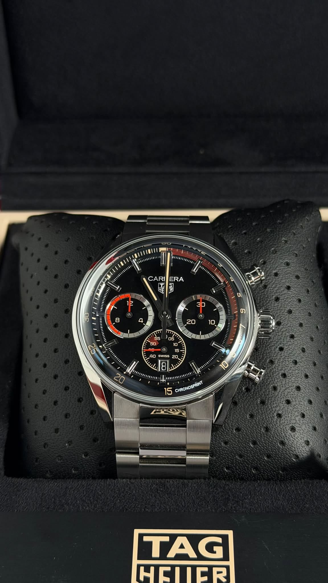 May be an image of wrist watch and text