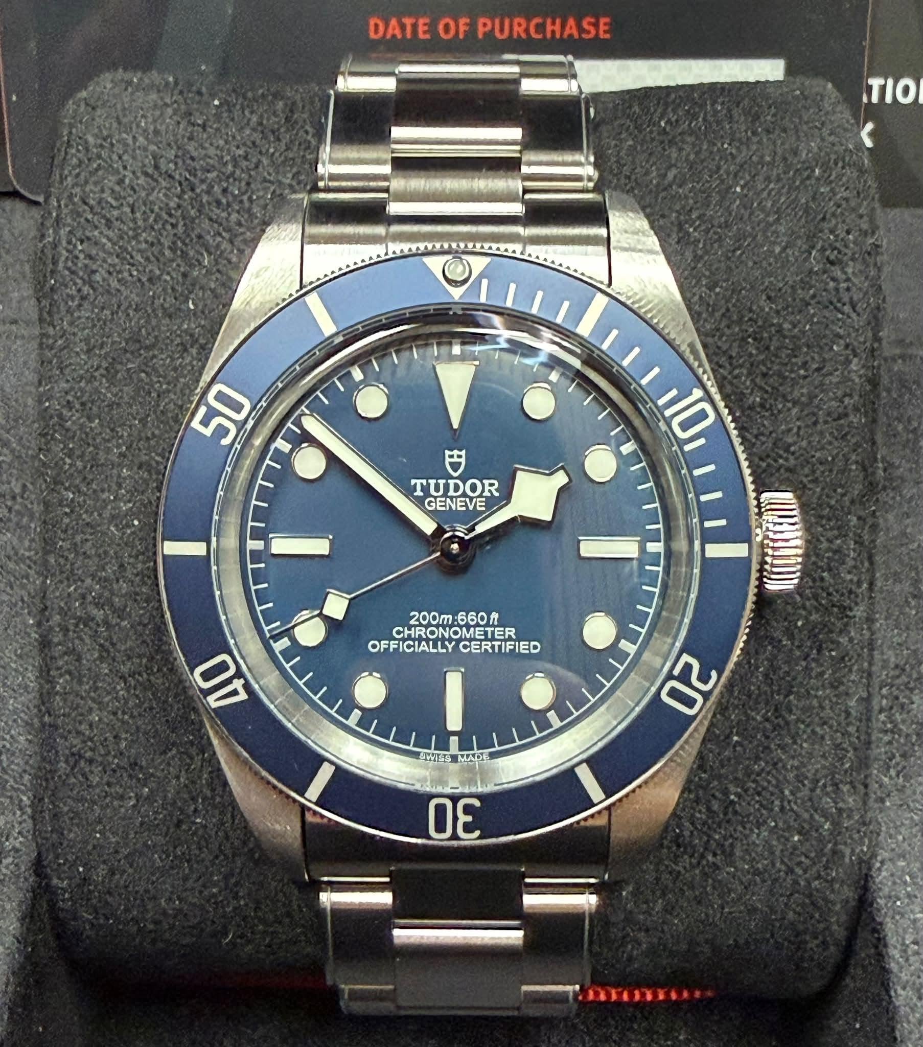 May be an image of wrist watch and text that says 'DATE DATEOFPURCHASE OF PURCHASE τιο 50 TUDOR GENEVE 10 200m:660f :660n 200m CHRONO CHRONOM HRONOMETER NOMETER ER OFFICIALLY…