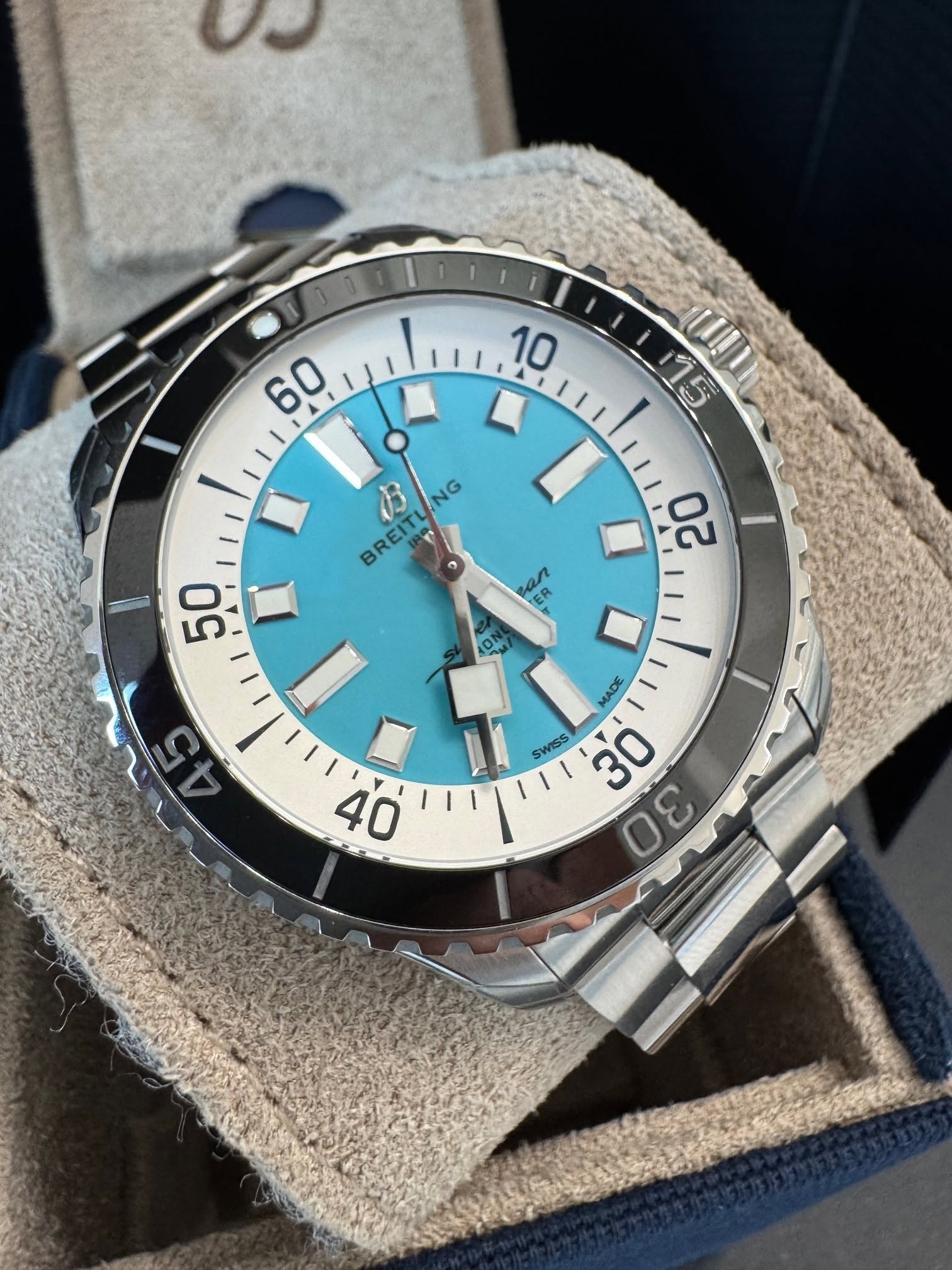 May be an image of wrist watch and text that says '0O 60 ለ 1I 75 F 10 無 L B NG BREIR 50 ロ IE ON 00 20 MADE SWISS SWS 3 30 n Go'