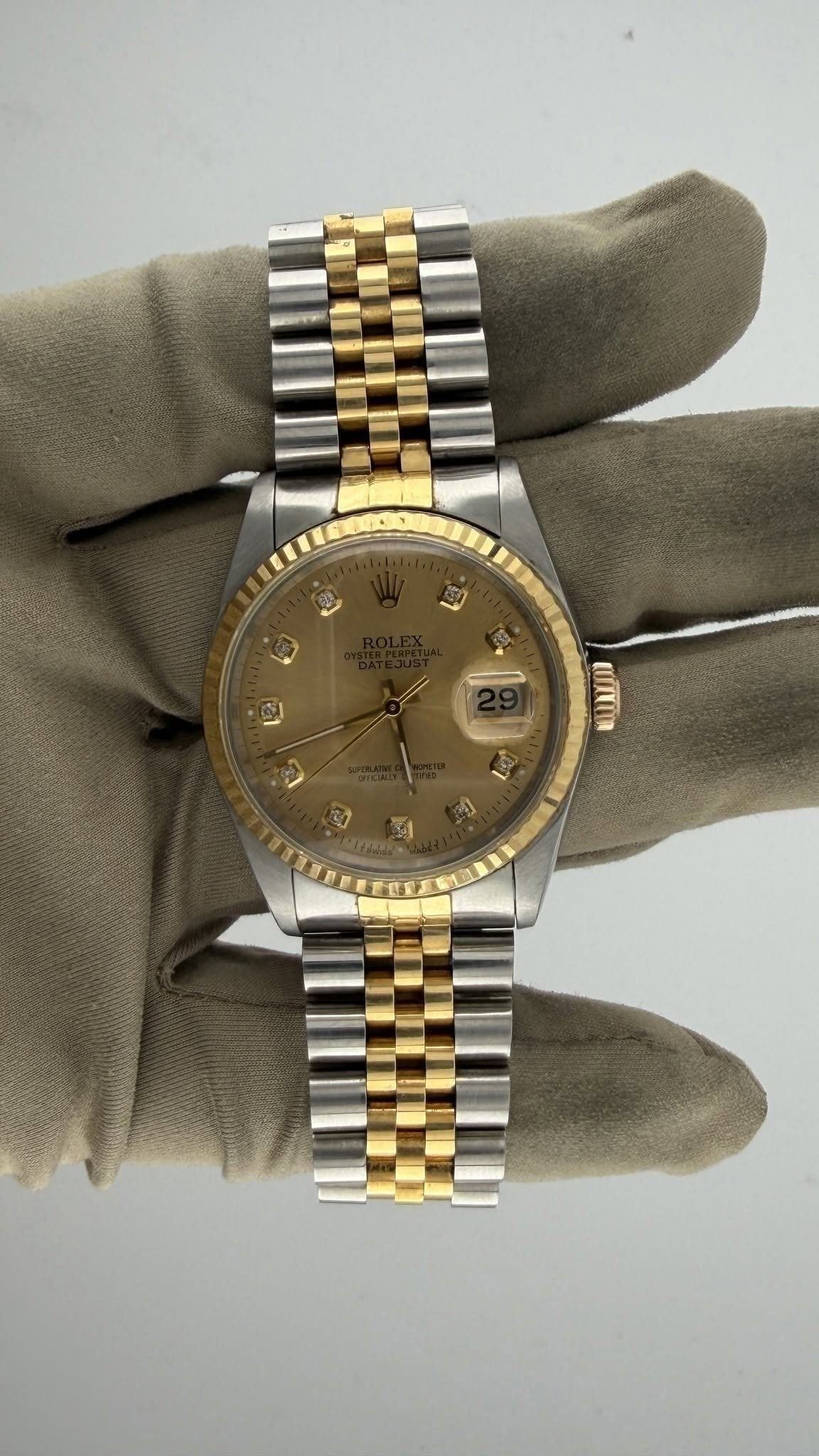 May be an image of wrist watch and text