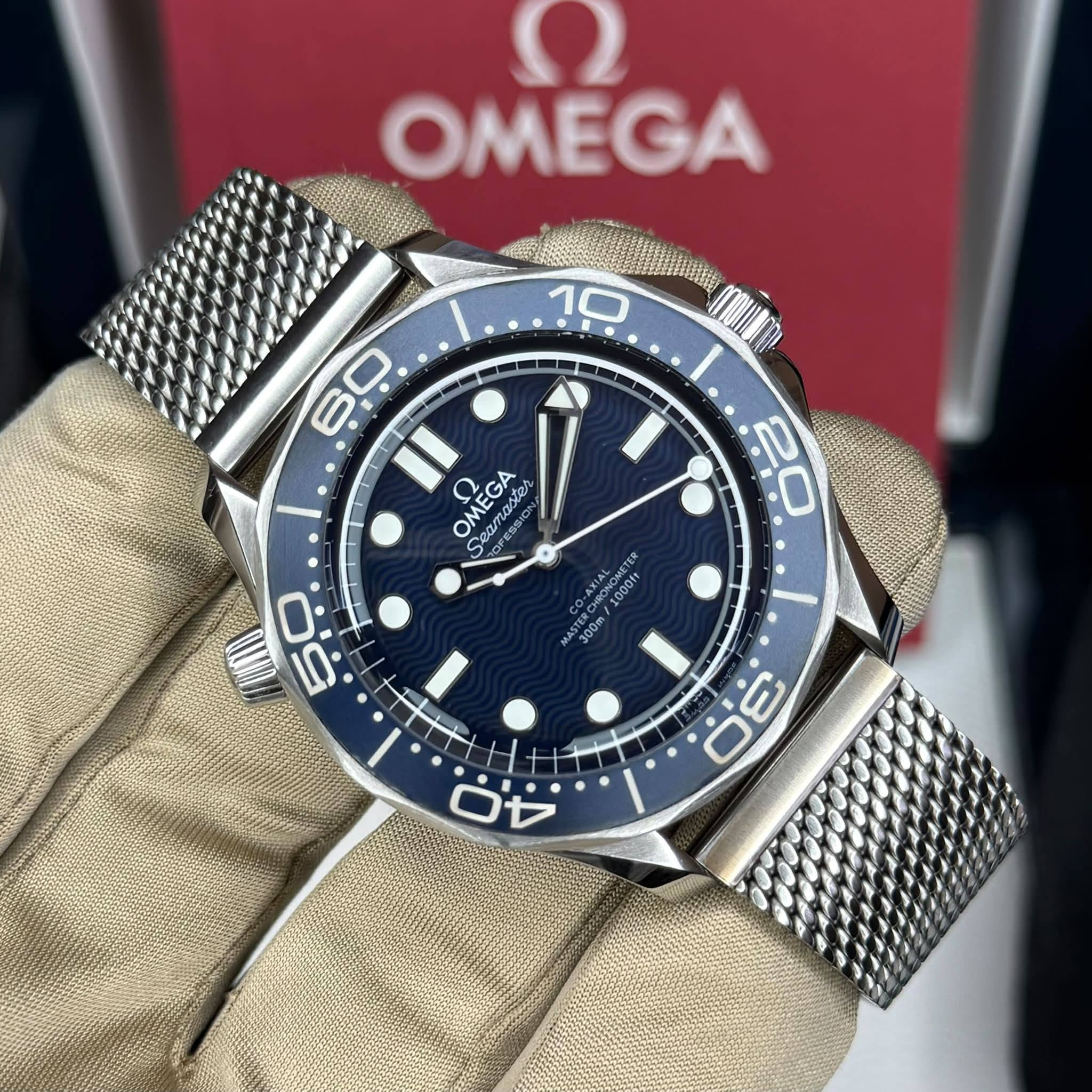May be an image of wrist watch and text that says 'OMEGA 10 量 ጠው 20 60 Il OMEGA Cea OMEGA Sermcat 品 GA nαc ter ブシ eHa ウつ ب جخ خ CO 1000f 300m 300m/1000f 300m 30'