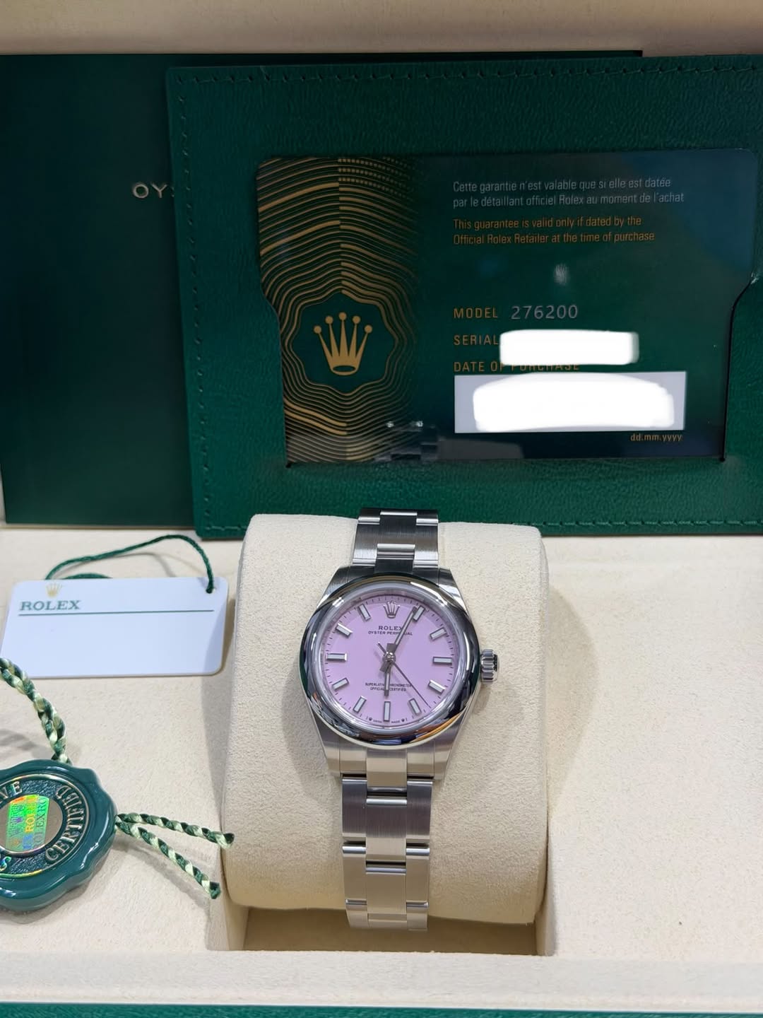 May be an image of wrist watch and text