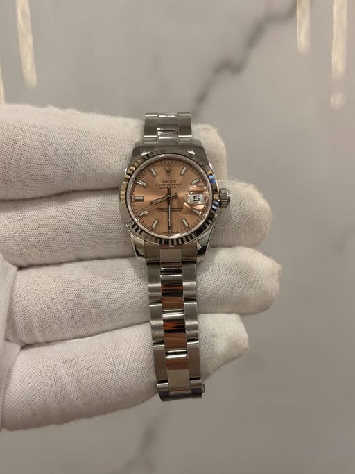 May be an image of wrist watch