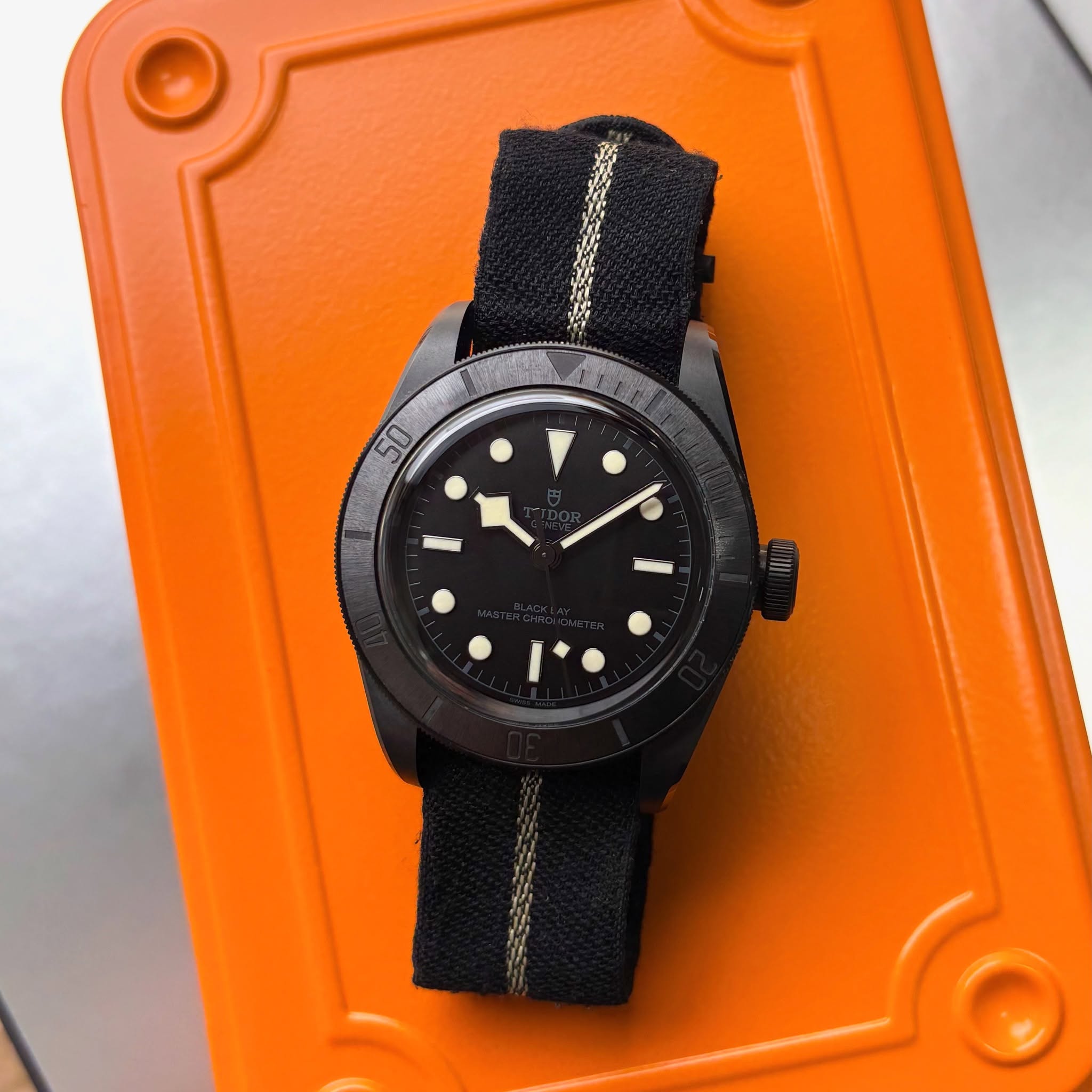 May be an image of wrist watch and text that says 'E'