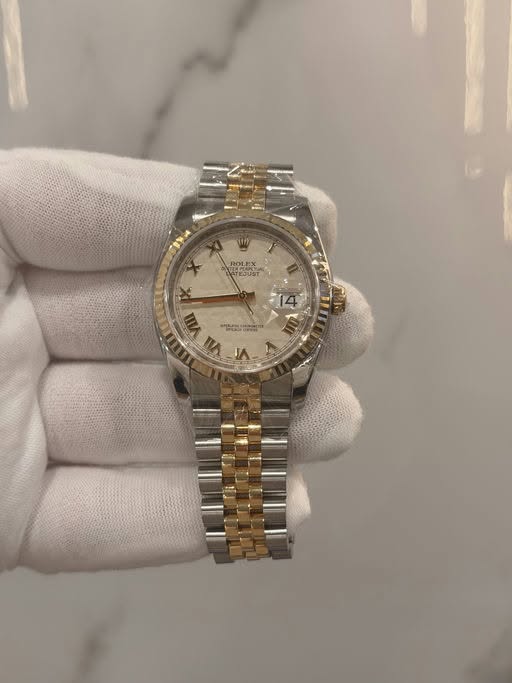 May be an image of wrist watch and text that says 'ROLEX 4 X ৯ vin ام O VII A 4 ٣'