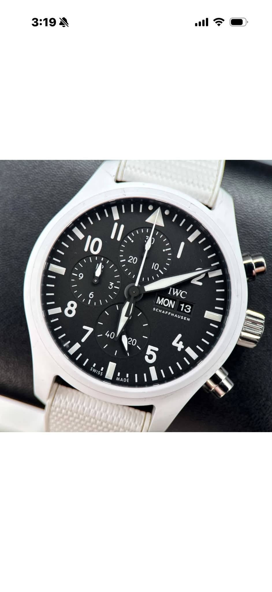 May be an image of digital watch and text that says '3:19 ¥ II - L IWC MON 13 SCHAPEHAUSEN HAUSEN 6 8 7 40 I wiss 20 ن 4 5 I ·! MADE'