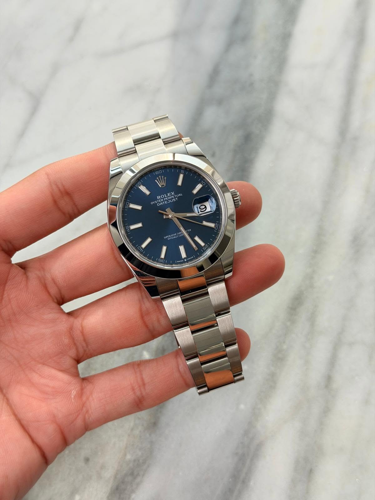 May be an image of wrist watch and text that says 'ROLEX 9 ο'