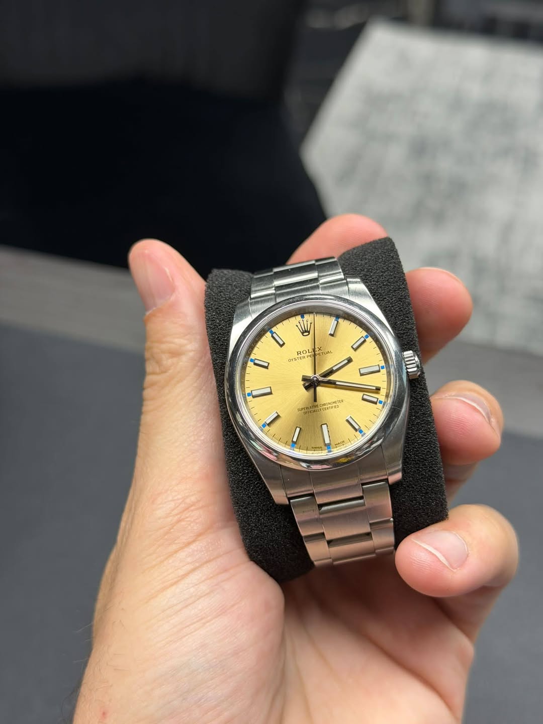 May be an image of wrist watch and text