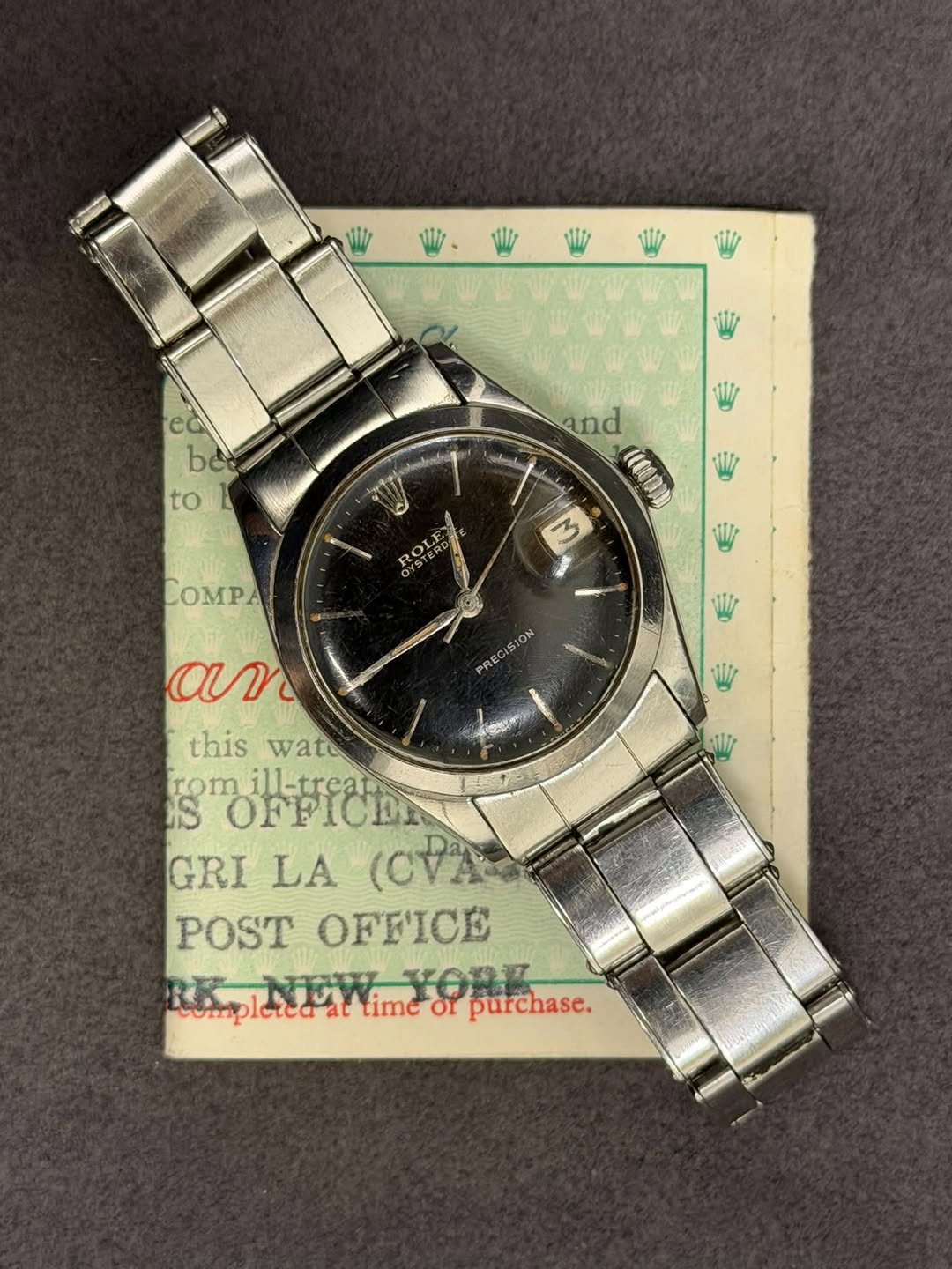 May be an image of wrist watch and text that says 'W ec bec to and M ROLE OYSTERE M W ស្ញើរ i עשב an PRECISION this wate 1 rOm comill-trear ill-trea S OFFICEN GRI LA (CDA POST…