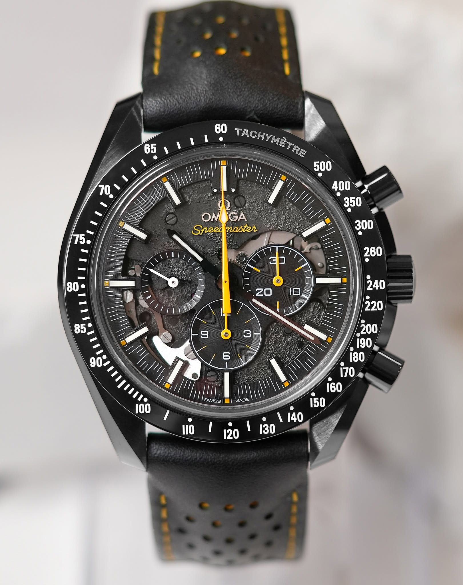 May be an image of wrist watch and text that says '60 65 T0 YMETRE 500 RUTII OM GA Speeo naster 300 80 ㄷ コ P ١ 3 85 ססיייוןריויקי ደስ SwE V 140 I30 MADE 110 120'