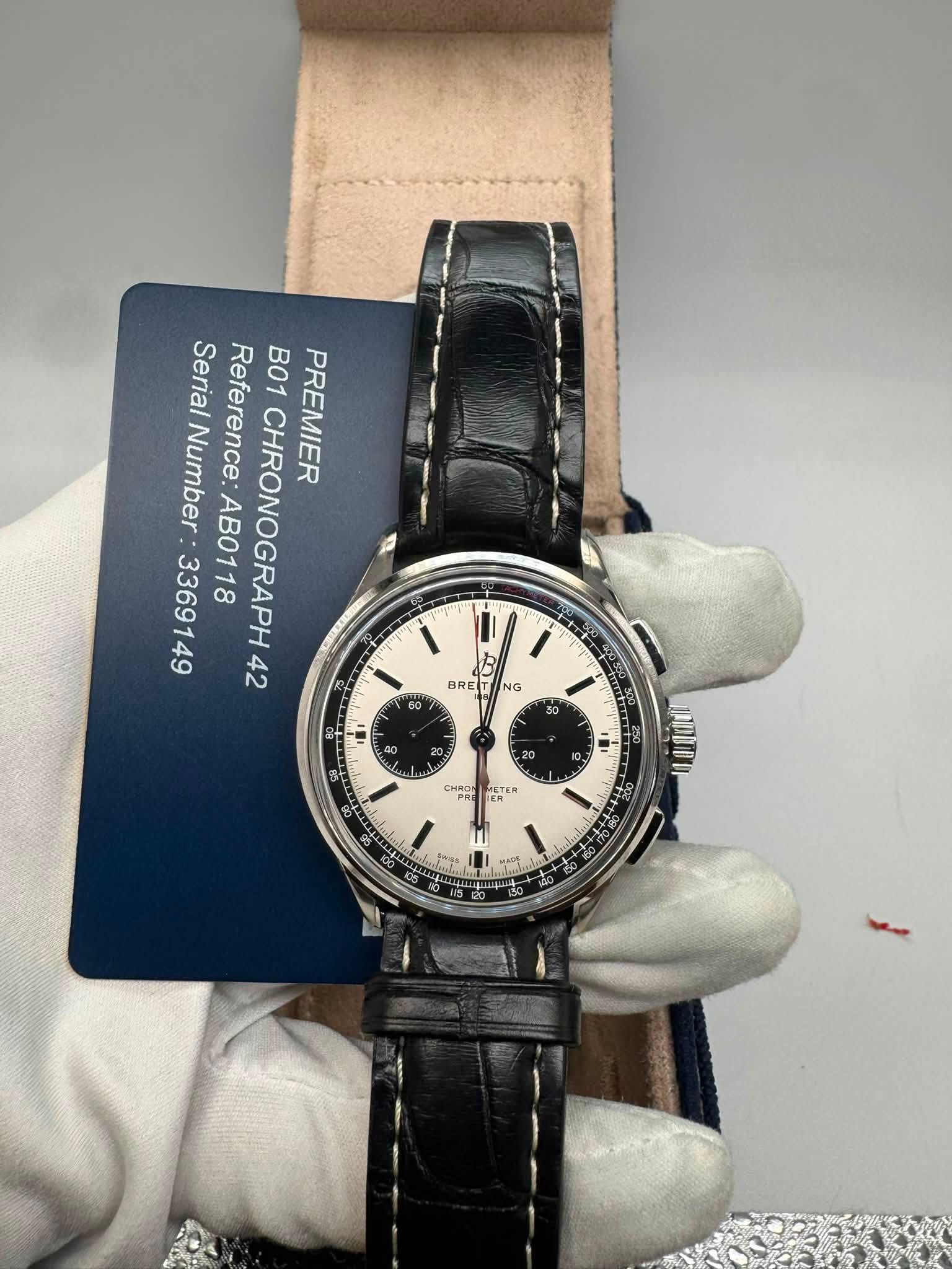 May be an image of wrist watch and text that says 'Serial Reference: 42 CHRONOGRAPH4 B01 PREMIER Number AB0118 R NG NG BRET 60 30 & 20 250 ری 3 CHRON METER'