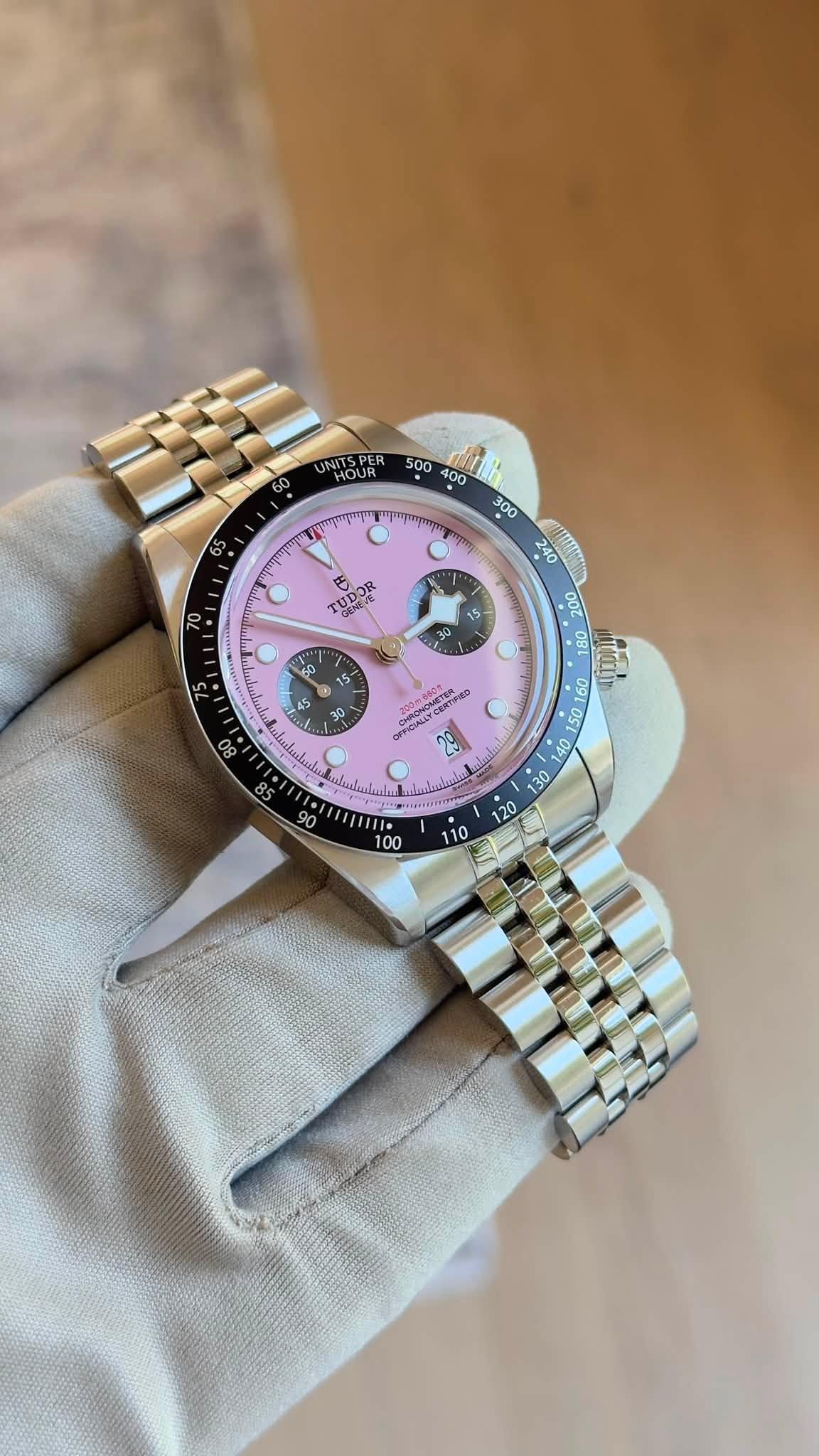 May be an image of wrist watch and text