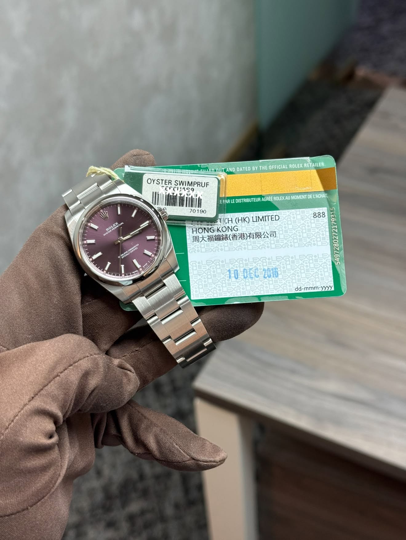 May be an image of wrist watch and text