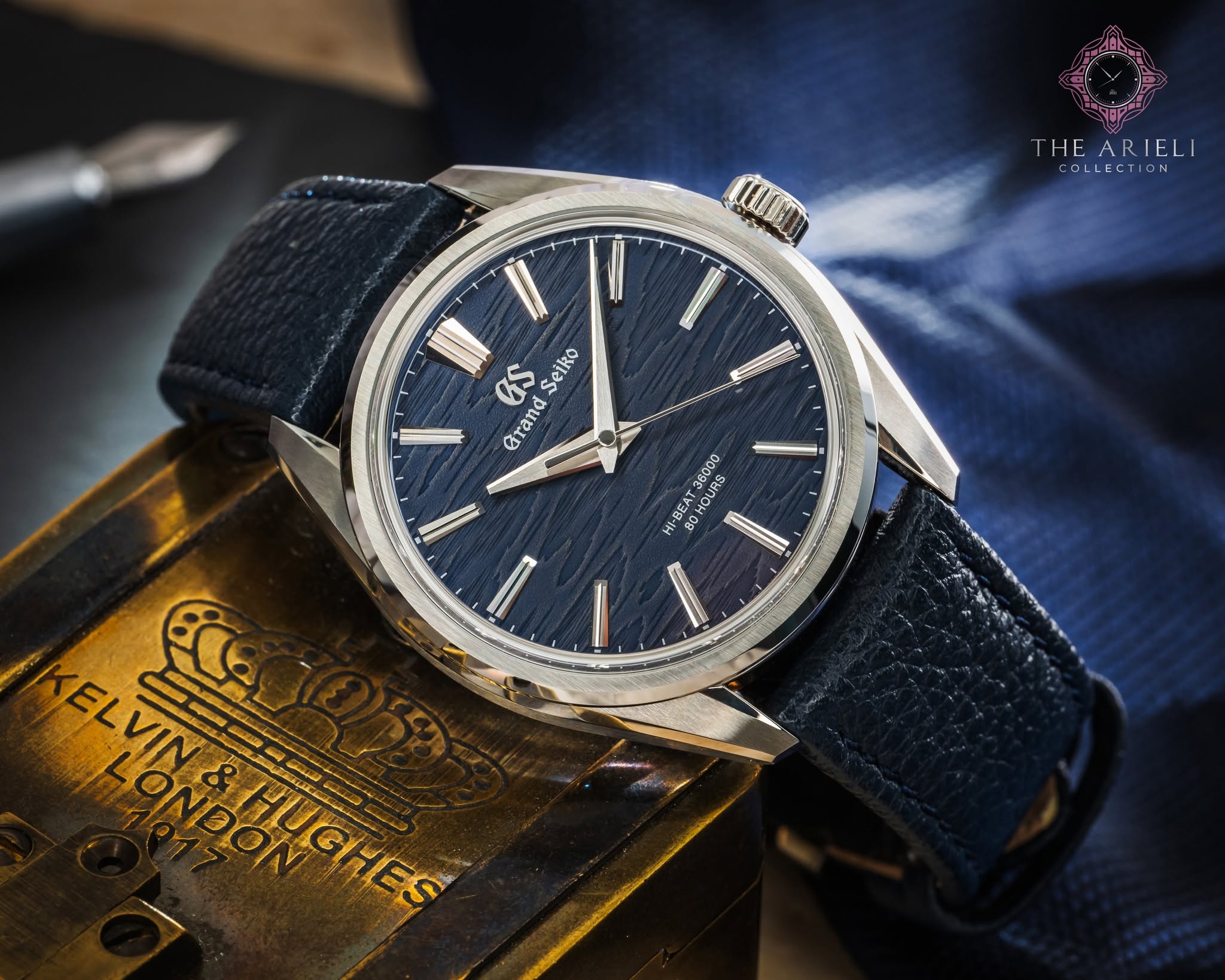 May be an image of wrist watch and text that says 'THE THEARIELI ARIELI EDLLECTION EDL mUANOH ណ GS Seiko Grand -BEAT BO Ho OUro OUAS 80'