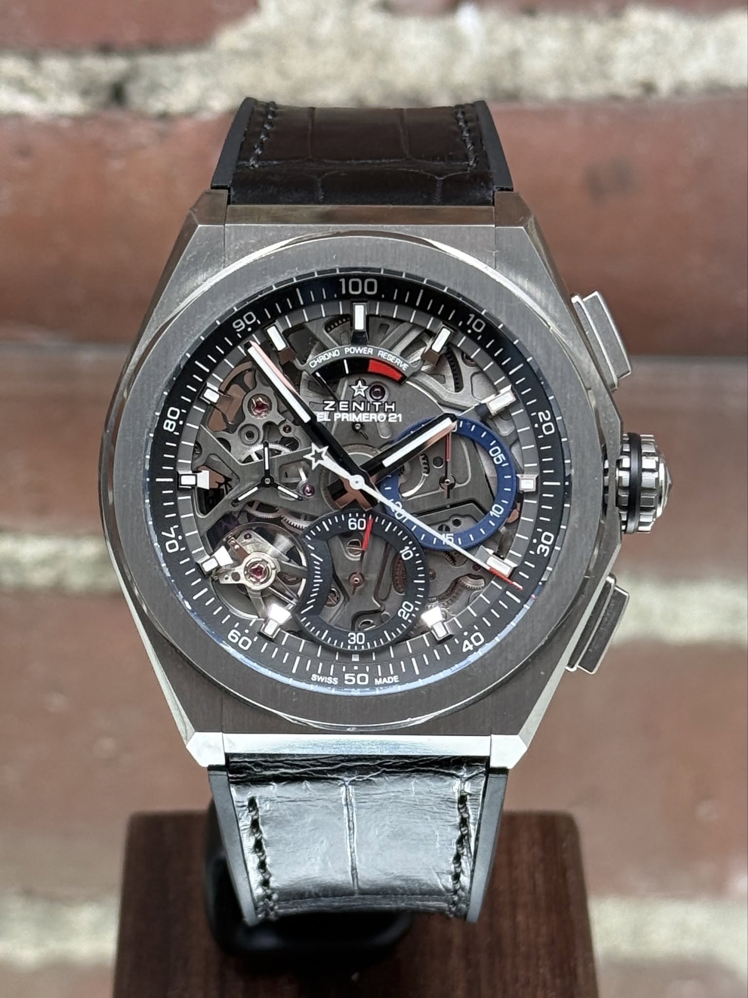 May be an image of wrist watch and text that says '100 90 CHPONO POWER RESRVE 80 ENITH EL PRIMERO21 UnTY ዐና 60 C O1 10 σε له 0F 20 60' O 30 40 0 SWISS S0 50 MADE 3'