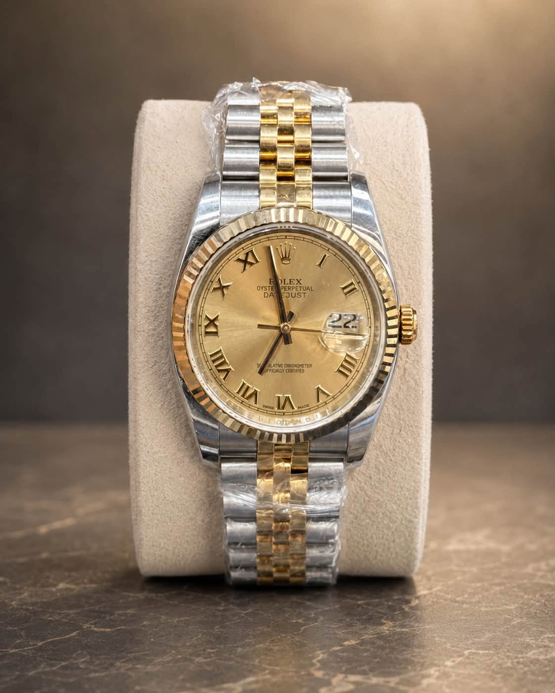 May be an image of wrist watch and text