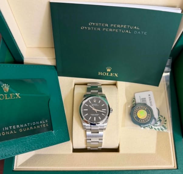 May be an image of wrist watch and text that says 'OYSTERPERPETUAL OYSTERPI OYSTERPERPETUALDAT OYSTERPERPETUAL OYSTER PERPETUAL RPETUAL DATE Wi ROLEX W LEX ၉၇0 INTERNATIONALE NTE…