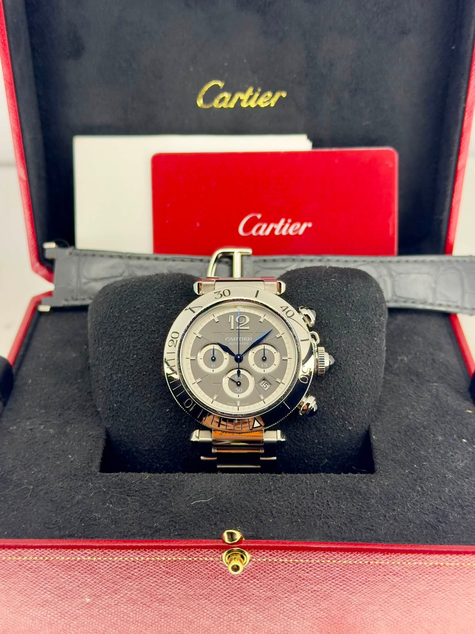 May be an image of wrist watch and text that says 'Cartier Cartier CAIC ษ 1ET: ط 1 G 6 mui 15'