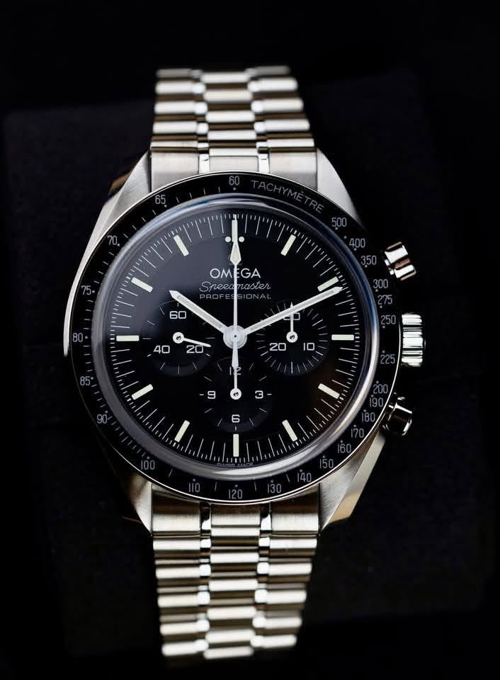 May be an image of wrist watch and text that says 'OMEGA EGA OM nneec ster nee ーdーー 6ဝေ ២ '