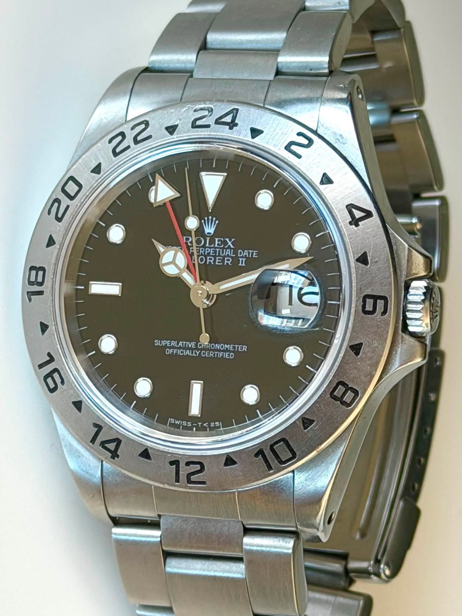 May be an image of wrist watch and text that says ' ROLEX ERPETUAL DATE ORER ERPETUALDATE II 4 m 18 IE リつま SUPERLATIVE CHRONOMETER SUPERLATIVECHONOMETER ER OFFICIALLYCERTIFIED…
