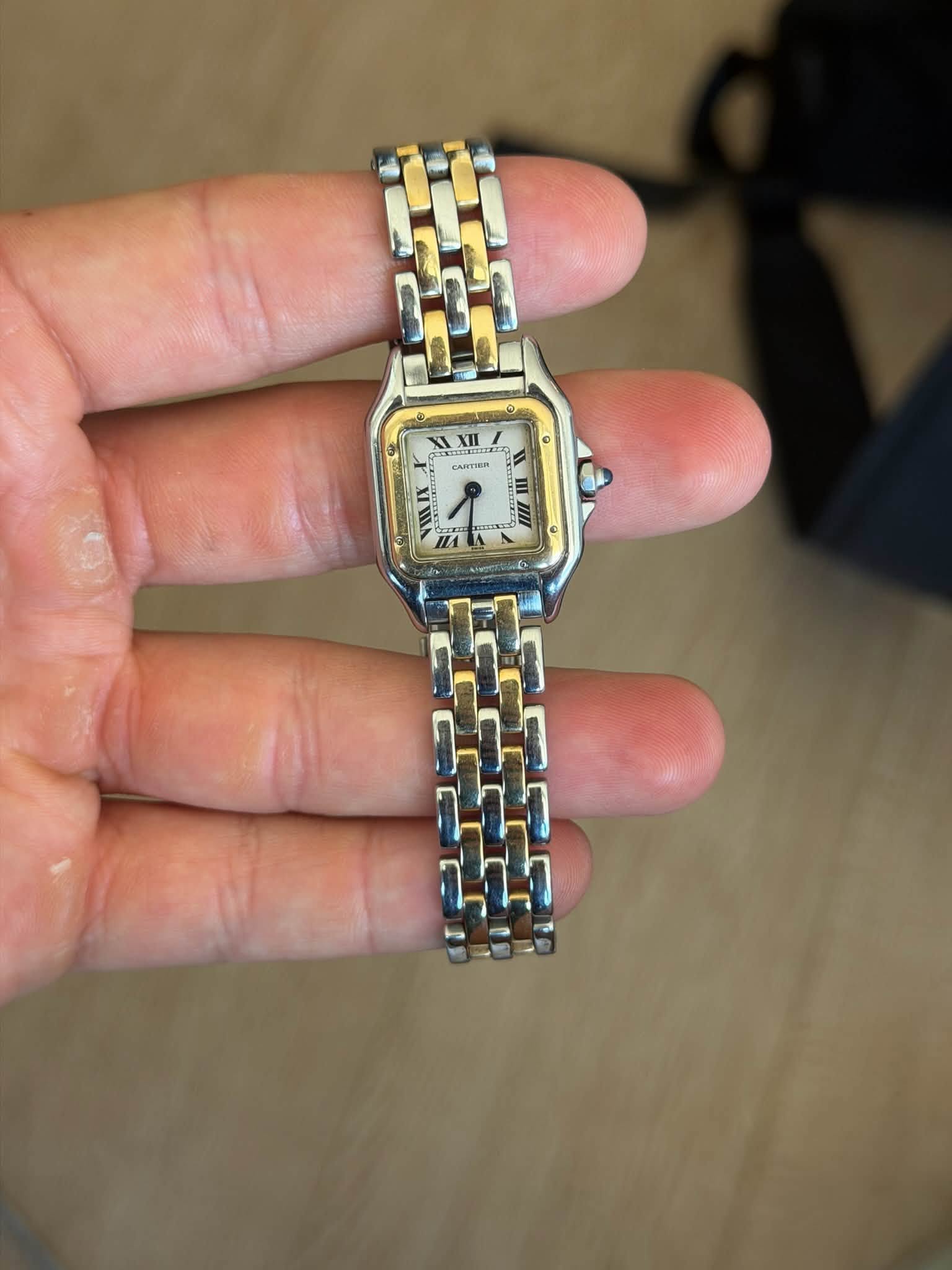 May be an image of digital watch and text