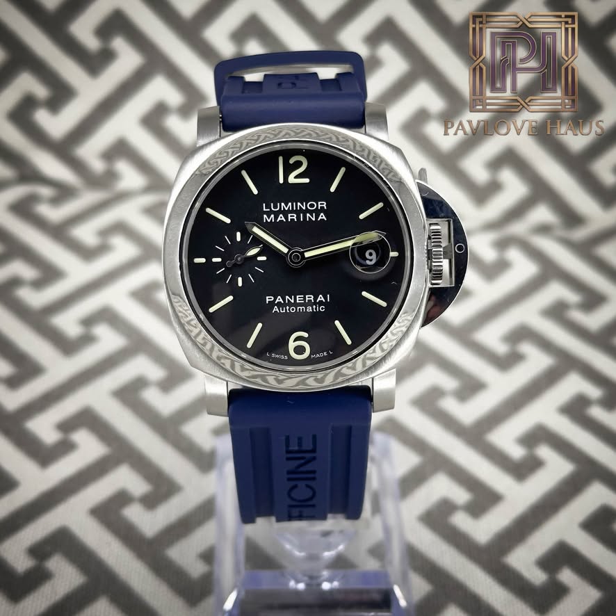 May be an image of digital watch and text that says 'PAVLOVE HAUS I 12 LUMINOR MARINA MAR NA 9 സർரறയ்ிபம் O PANERA PANERAI AI Auto Automatic matic atic SWITES 6 ADK'