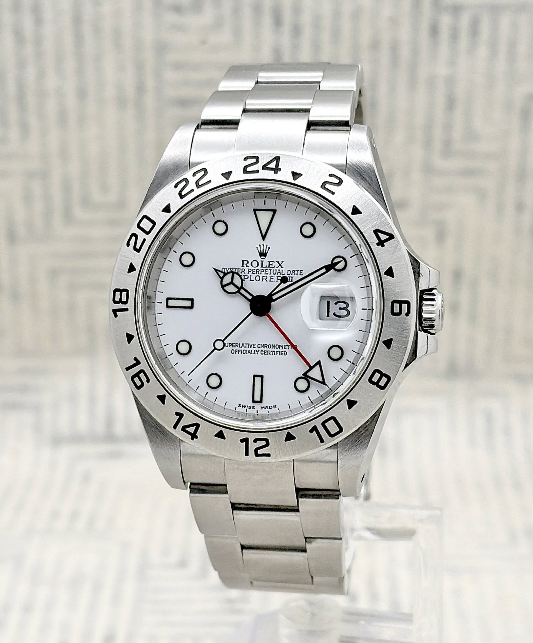 May be an image of wrist watch and text that says ' o 2 O P Mi ROLE PERPETUA EX AUSTER PERPETUAL DATE LOREE แมมิมพ UPERLATIVE JPERLATIVECARONOMIT CHRONOMET OFFICIALLY…