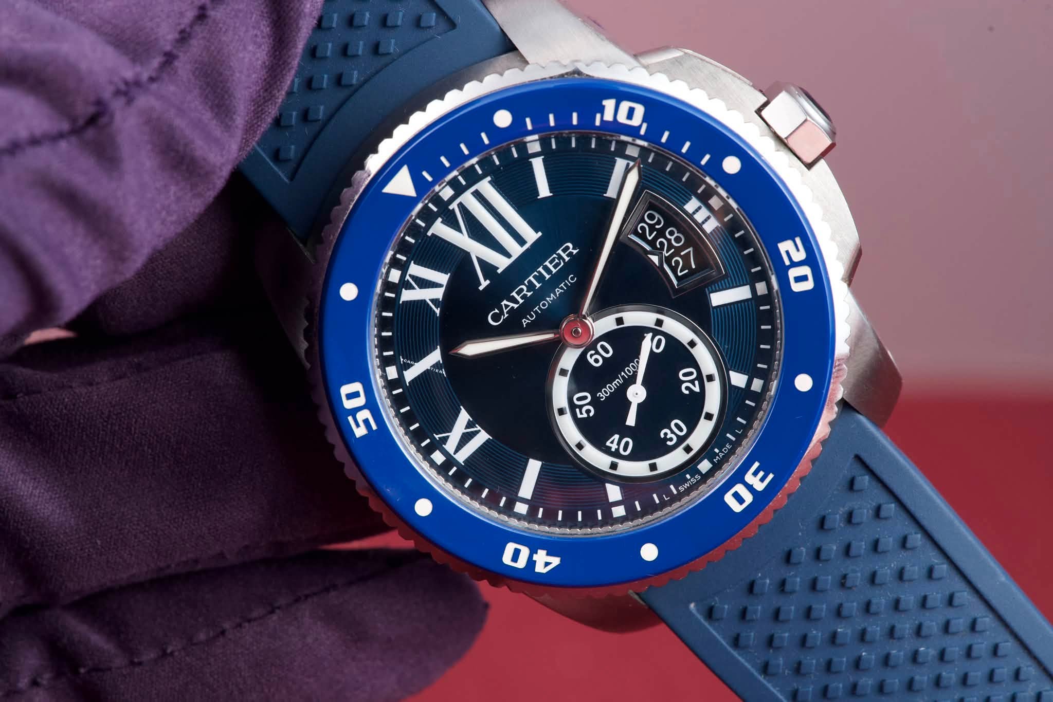 May be an image of wrist watch and text that says '10, 29 2សថស he XI CARTIER AU TOMATI 60 000 O 00m/ IX Swg。 30 3 "o 40'