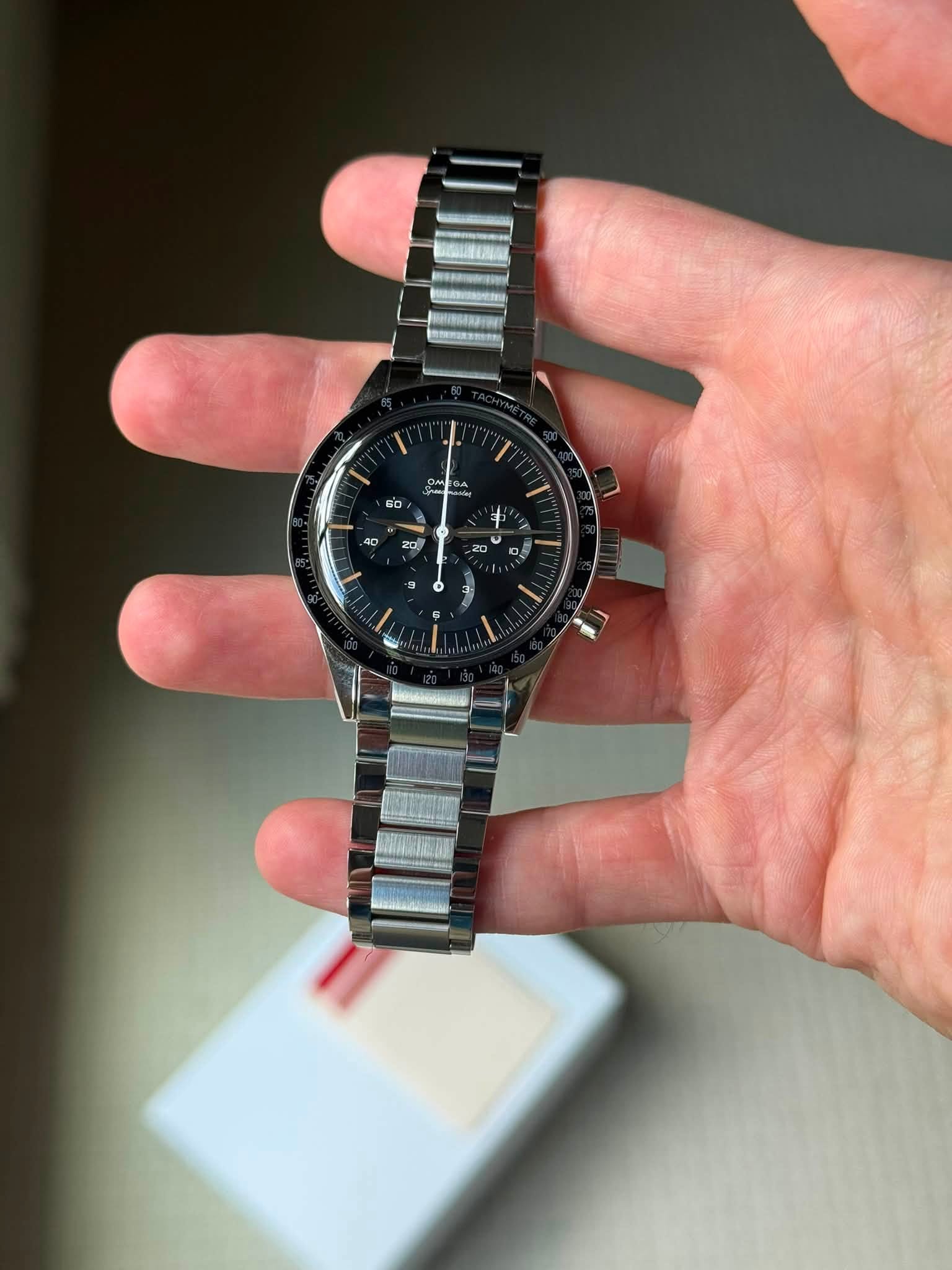 May be an image of wrist watch and text