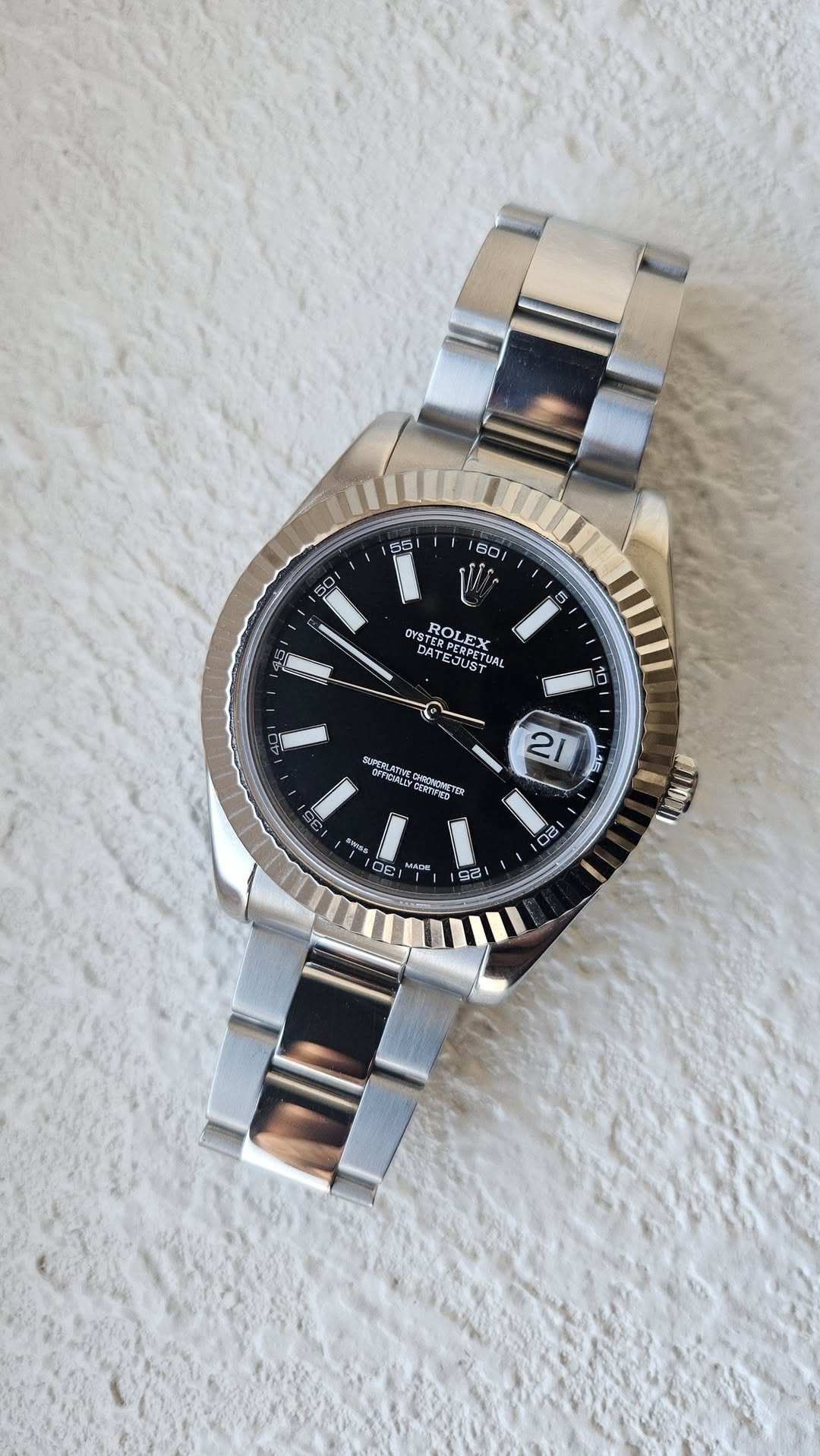 May be an image of digital watch and text