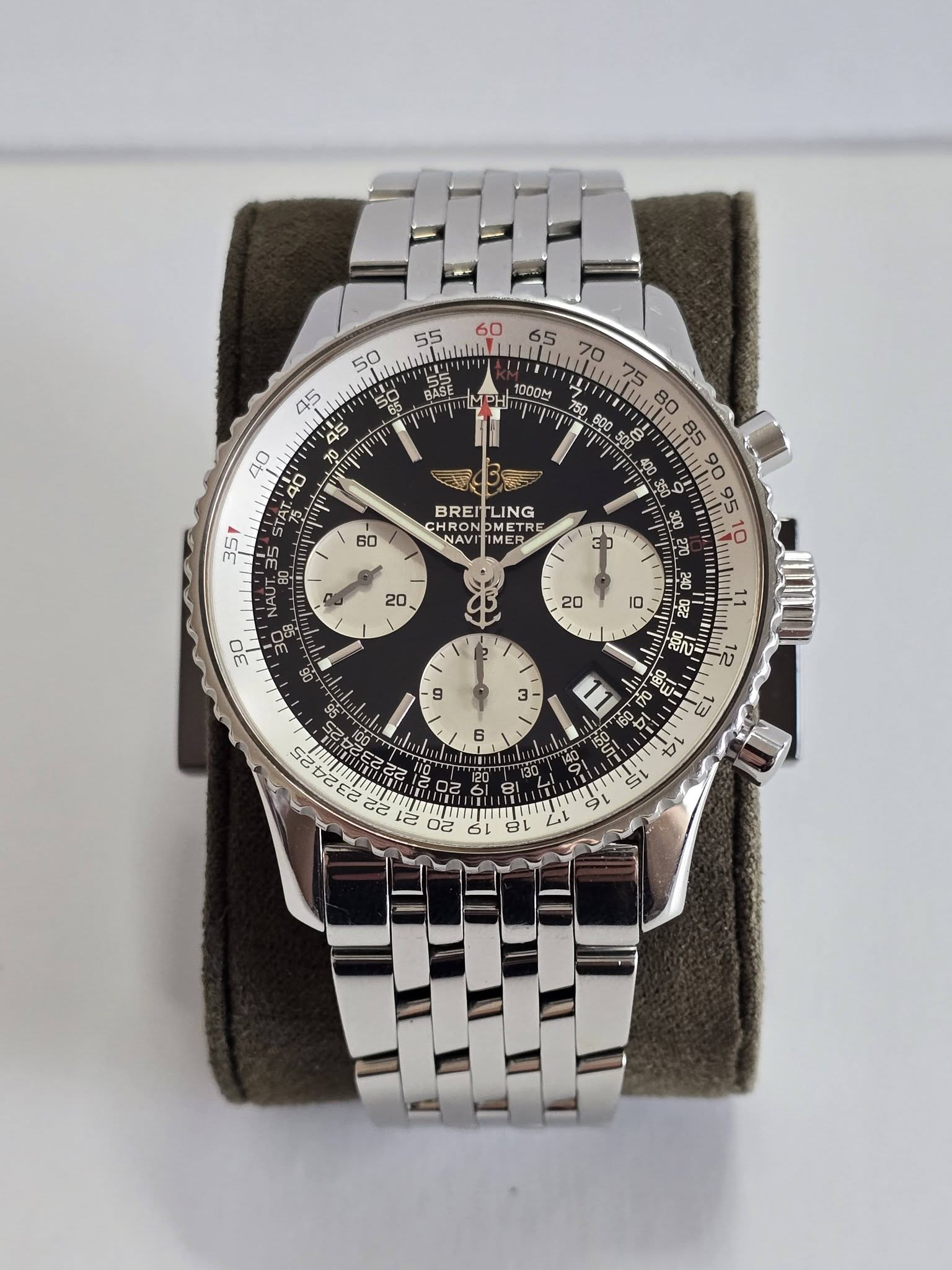 May be an image of wrist watch and text