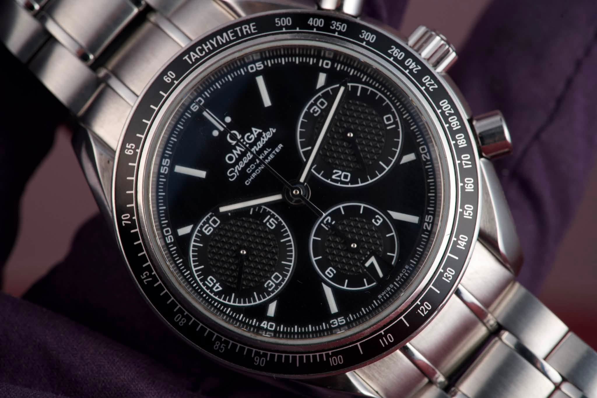 May be an image of wrist watch and text that says ' TACHYMETRE ןשויכסיו 05 60 10 ၁ေ 65 30 55 0I OMI Sheed MI:GA :GA naster oZ ភិ 0 9 25 S5 5 S 6 140 ២ '