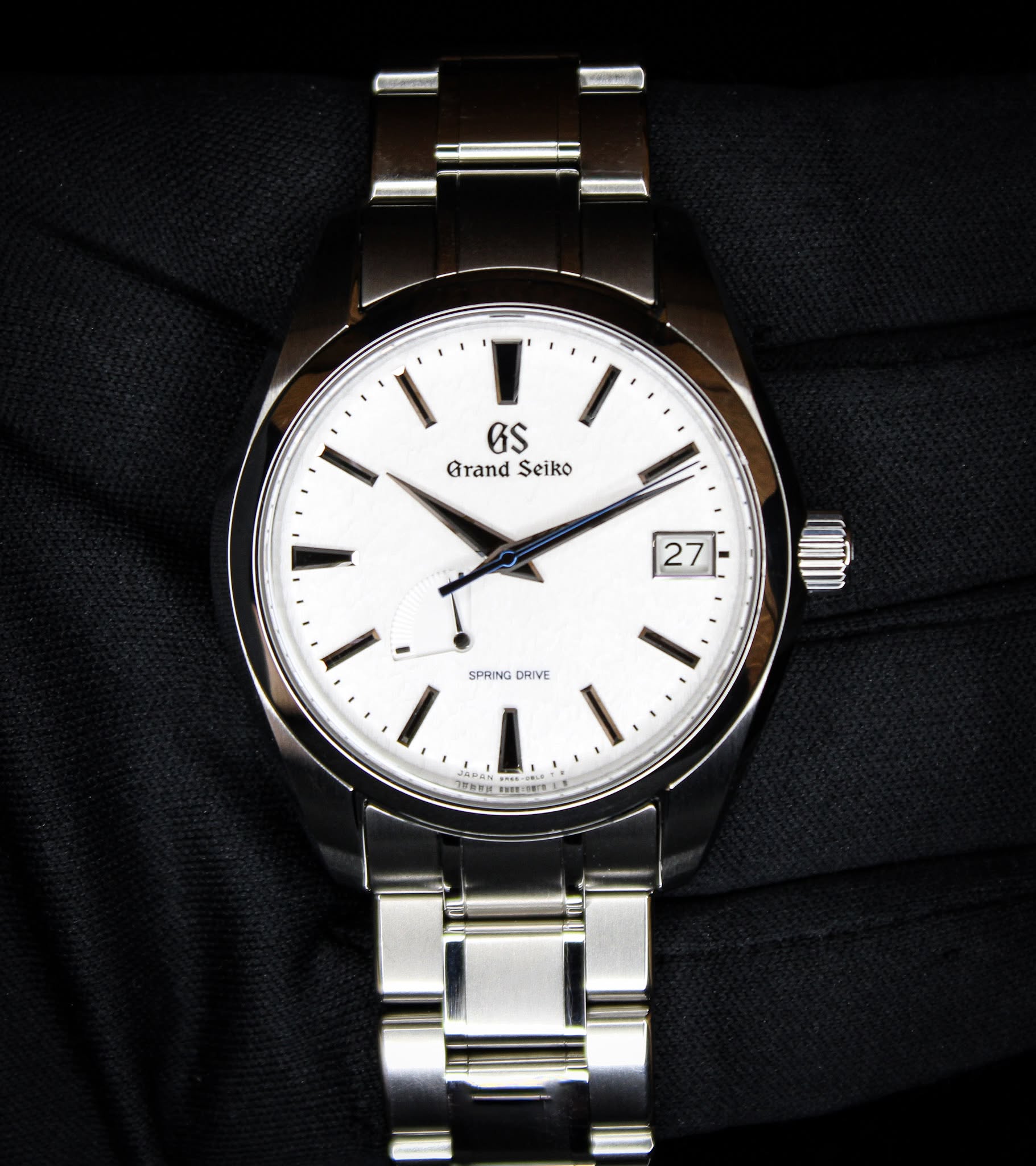 May be an image of wrist watch and text that says 'I GS Grand Seiko 27|- I. 1 SPRING DRIVE 포조럽H ا ልይቨል S APAN'