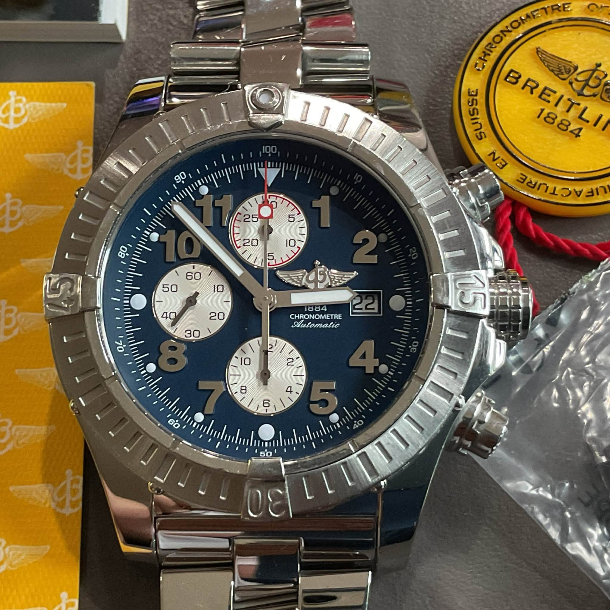May be an image of wrist watch and text