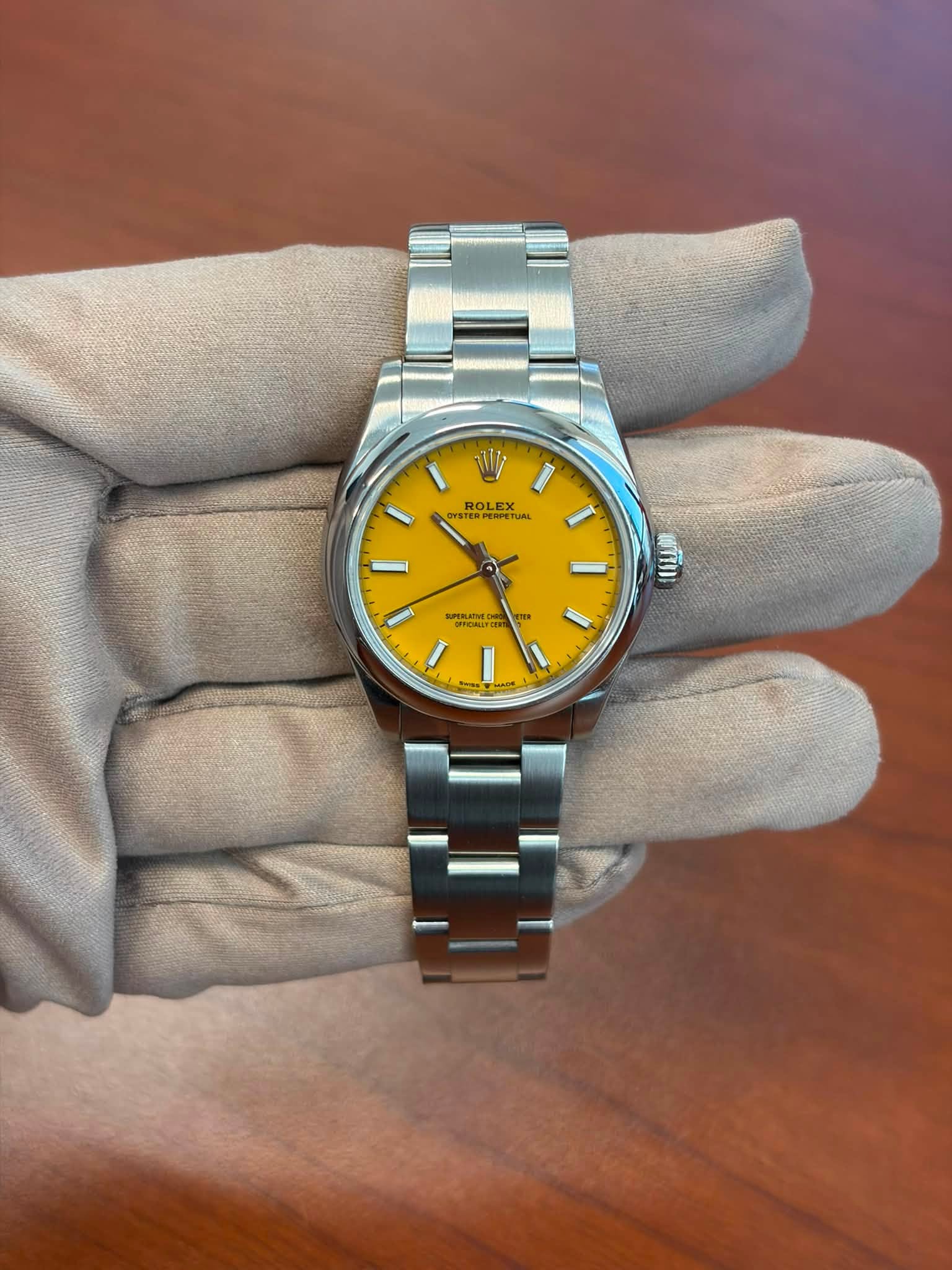 May be an image of wrist watch and text