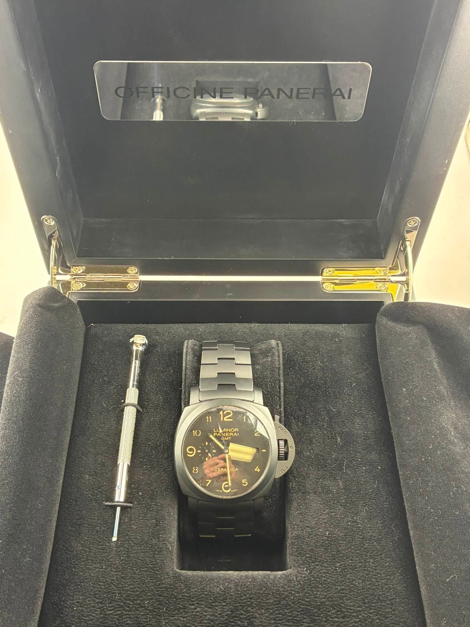 May be an image of digital watch and text that says 'ANERAI FFICINERANERA/ Al 11 12 10 PANERAI LLANOR PANERAL OMT 9 8 ECIAR I BIT 川 4 5'