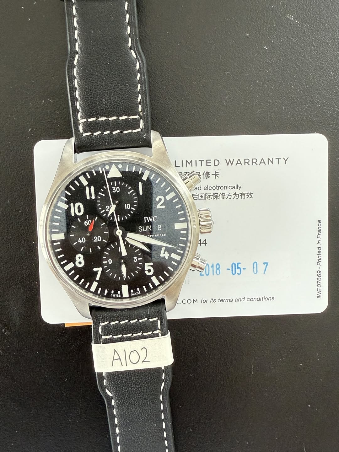 May be an image of wrist watch and text that says '30 LIMITED LIMITEDWARRANTY WARRANTY シ修卡 是修卡 electronloally 后国际保修方为有效 IWC SUN 8 PHAUSEN 20 I 、 5 $MISS หะ MACb د 熱A口 الاة anan…