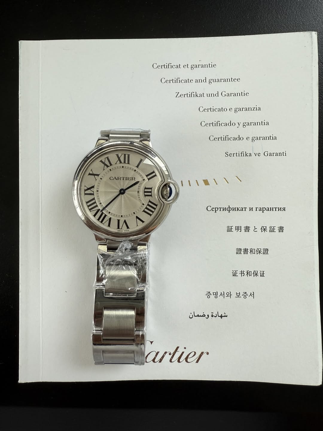 May be an image of digital watch and text that says 'Certificat et garantie Certificate and guarantee Zertifikat und Garantie Certicato garanzia Certificado garantia Certificado…